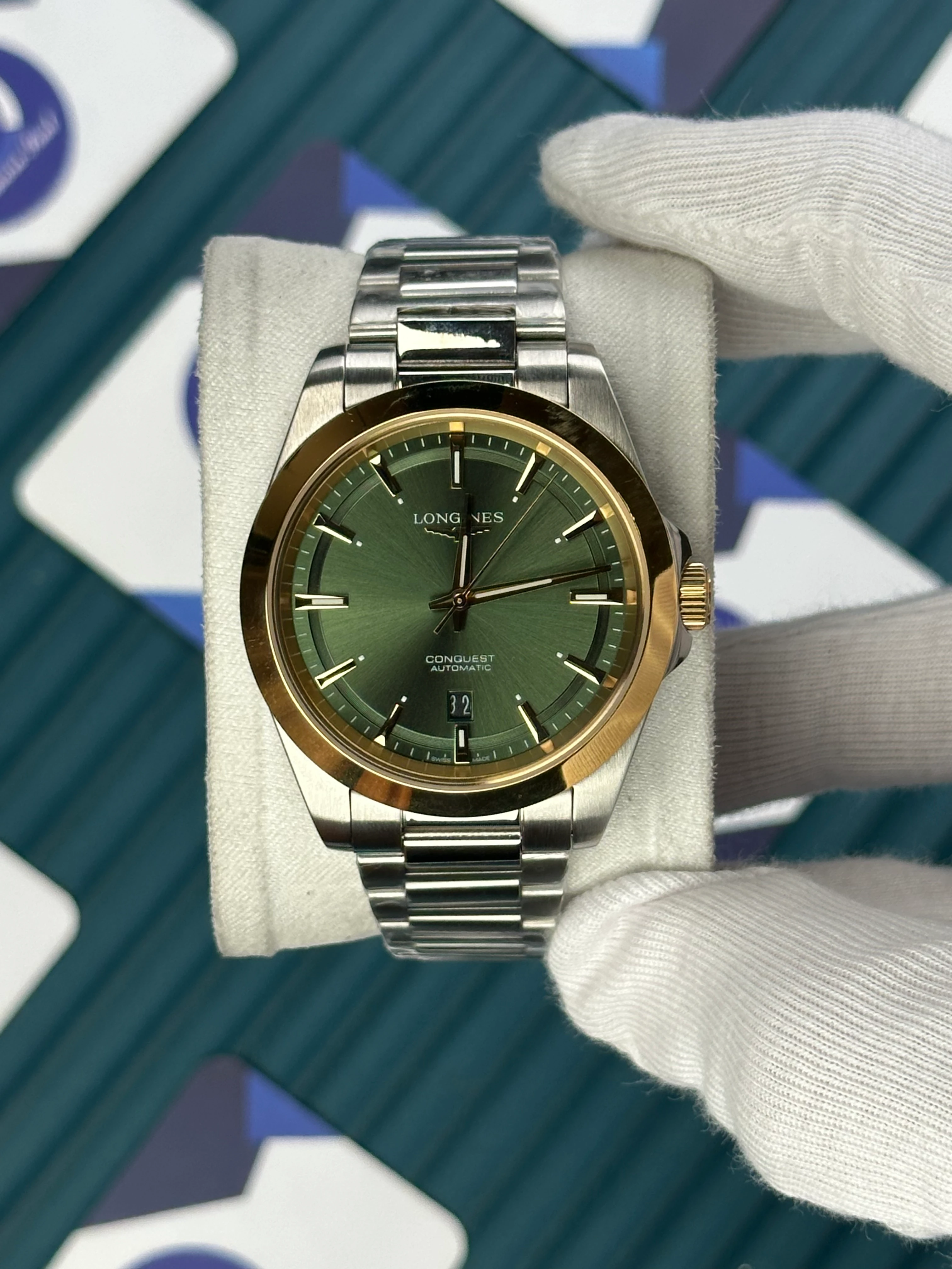 LONGINES CONQUEST AUTOMATIC GREEN DIAL GOLD BEZEL SILVER 
