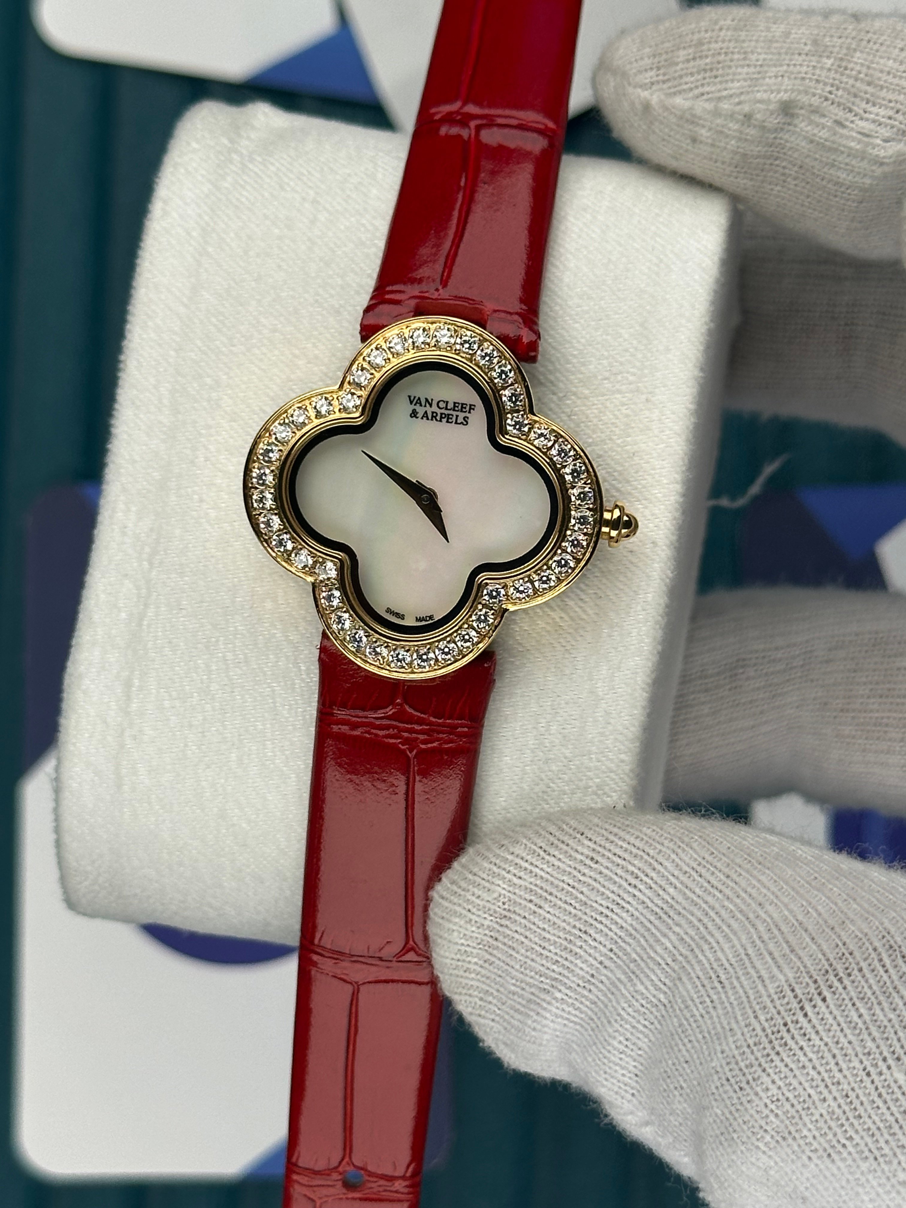 VAN CLEEF & ARPELS WHITE DIAL DIAMOND BEZEL GOLD CASE RED LEATHER CORD