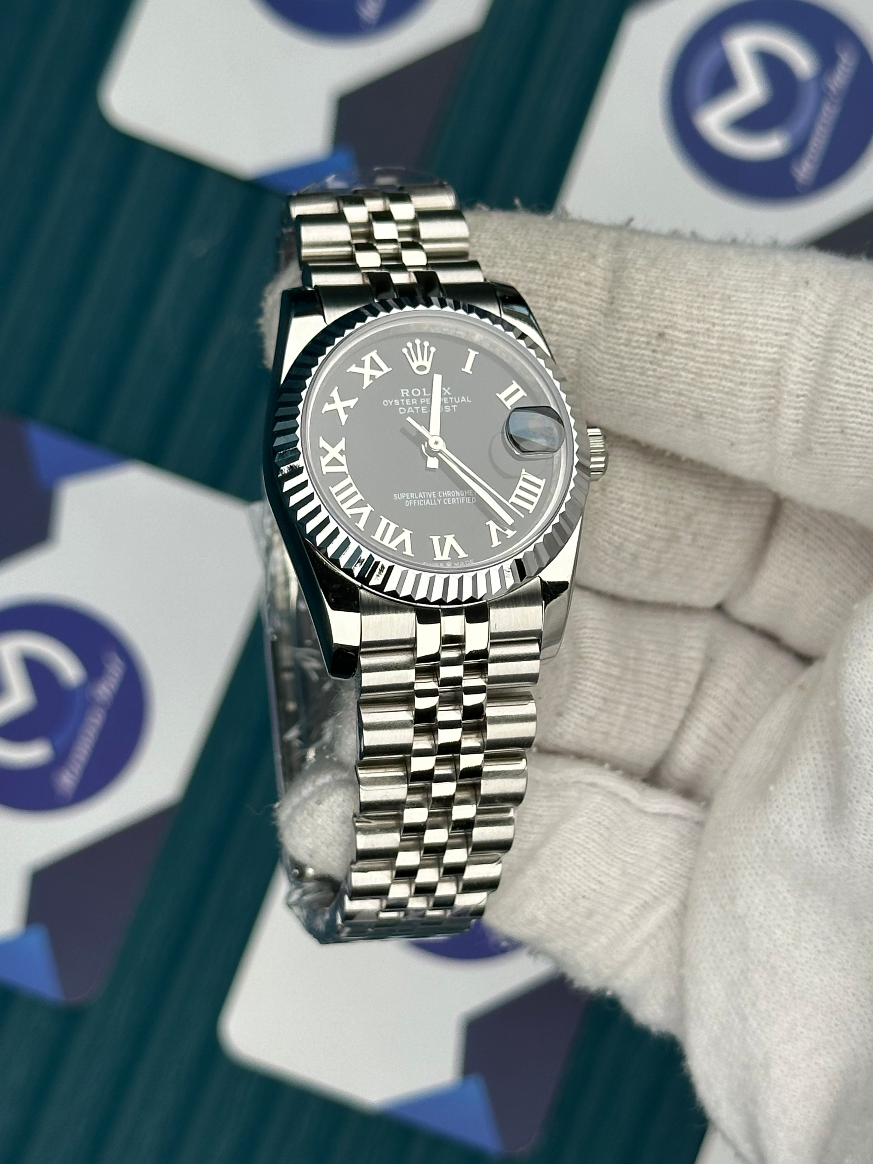 ROLEX 31 BLACK DIAL ROMA INDEX SILVER JUBILEE