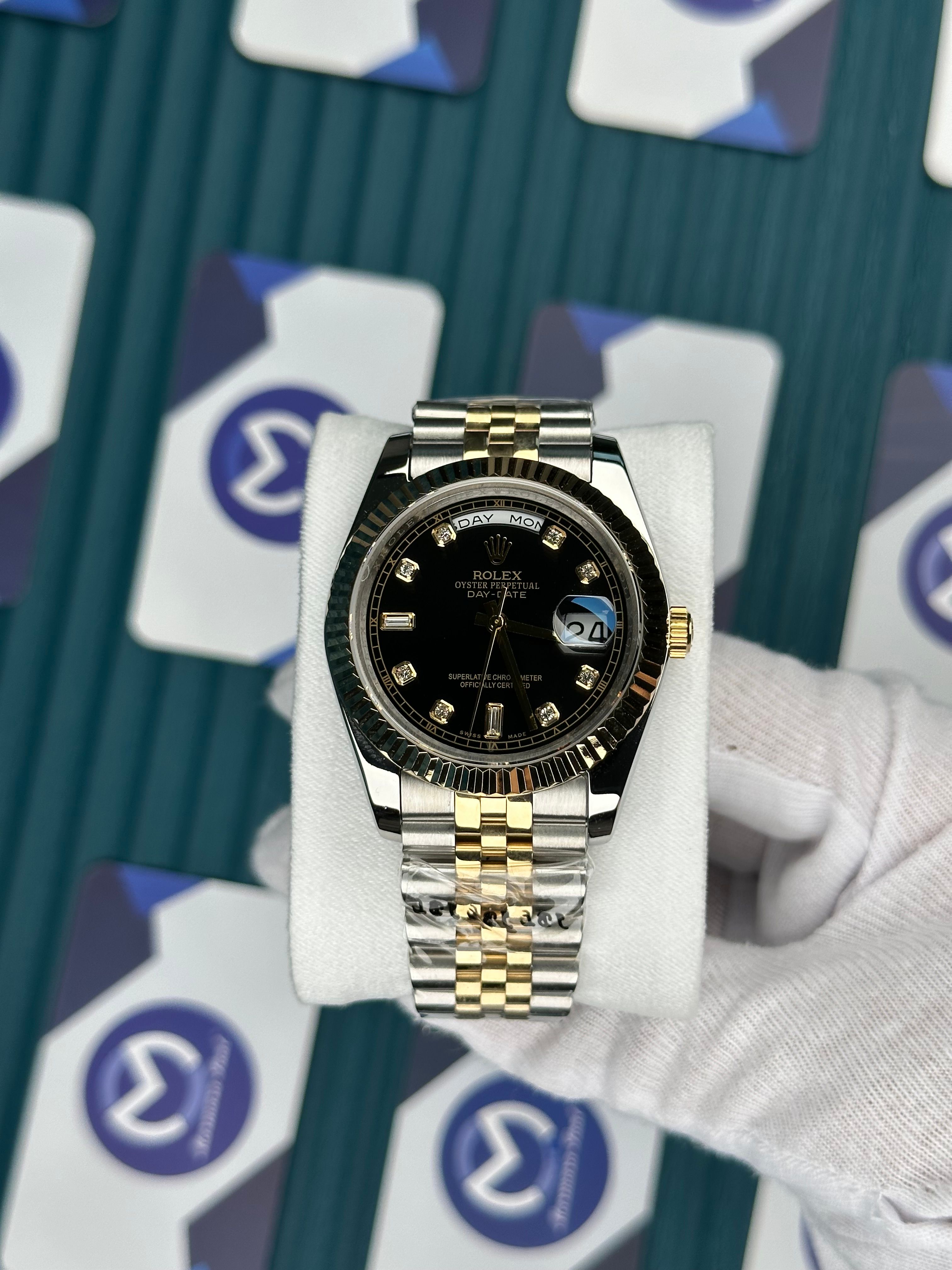 ROLEX DAY-DATE BLACK DIAL DIAMOND INDEX GOLD-SILVER JUBILE
