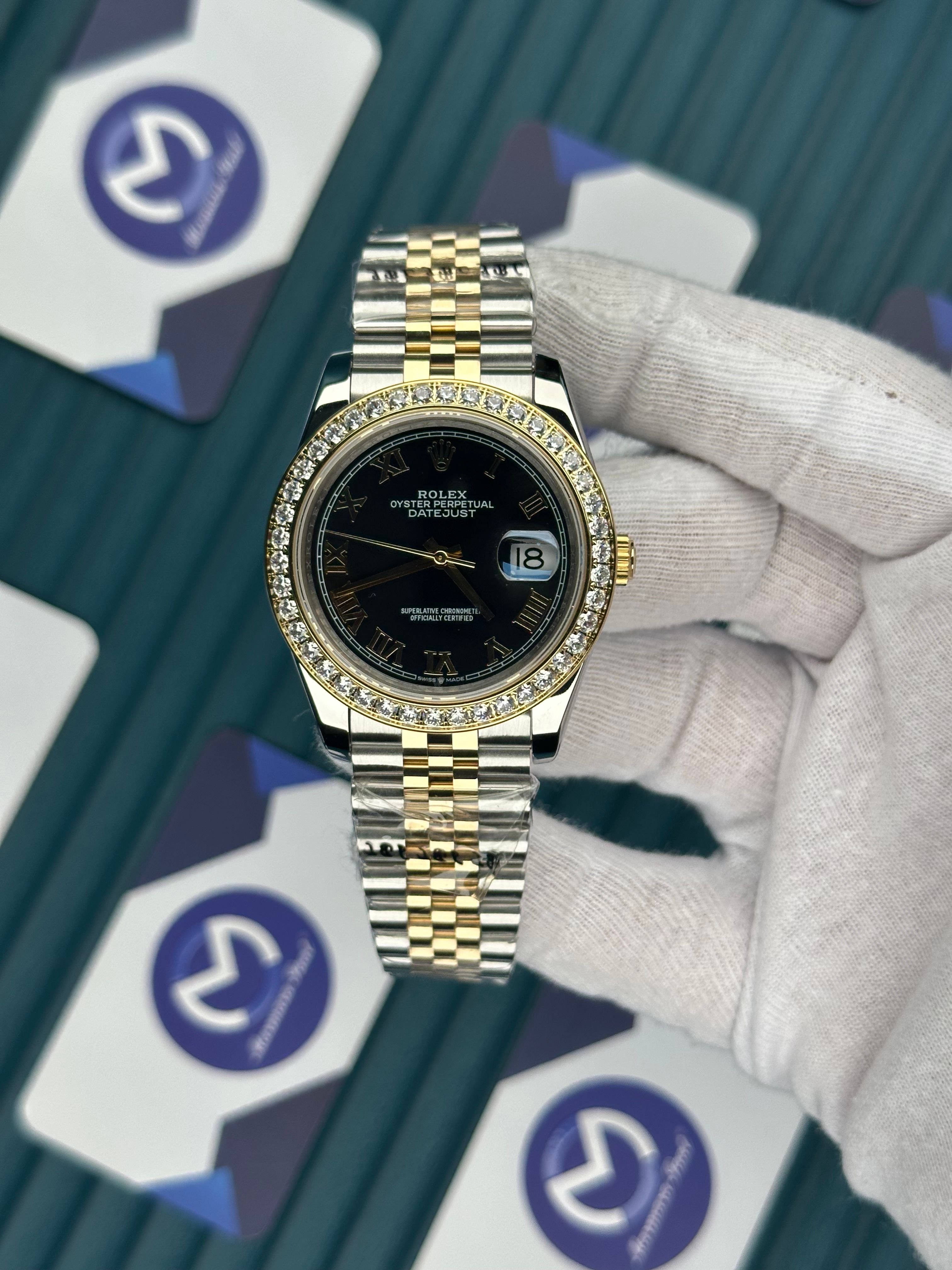 ROLEX DATEJUST BLACK DIAL DIAMOND BEZEL GOLDSILVER JUBILE