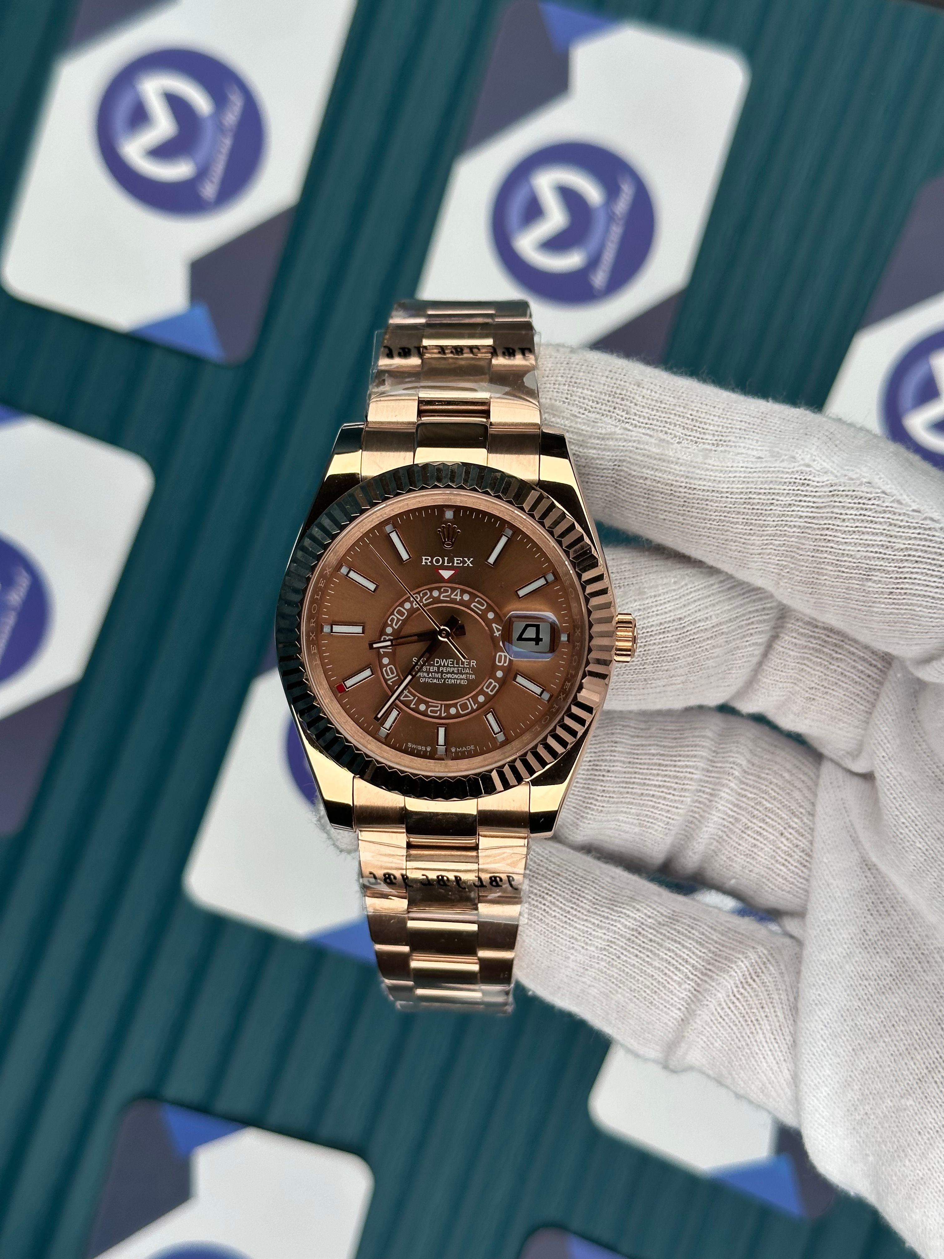 ROLEX SKY-DWELLER CHOCOLATE DIAL ROSE OYSTER