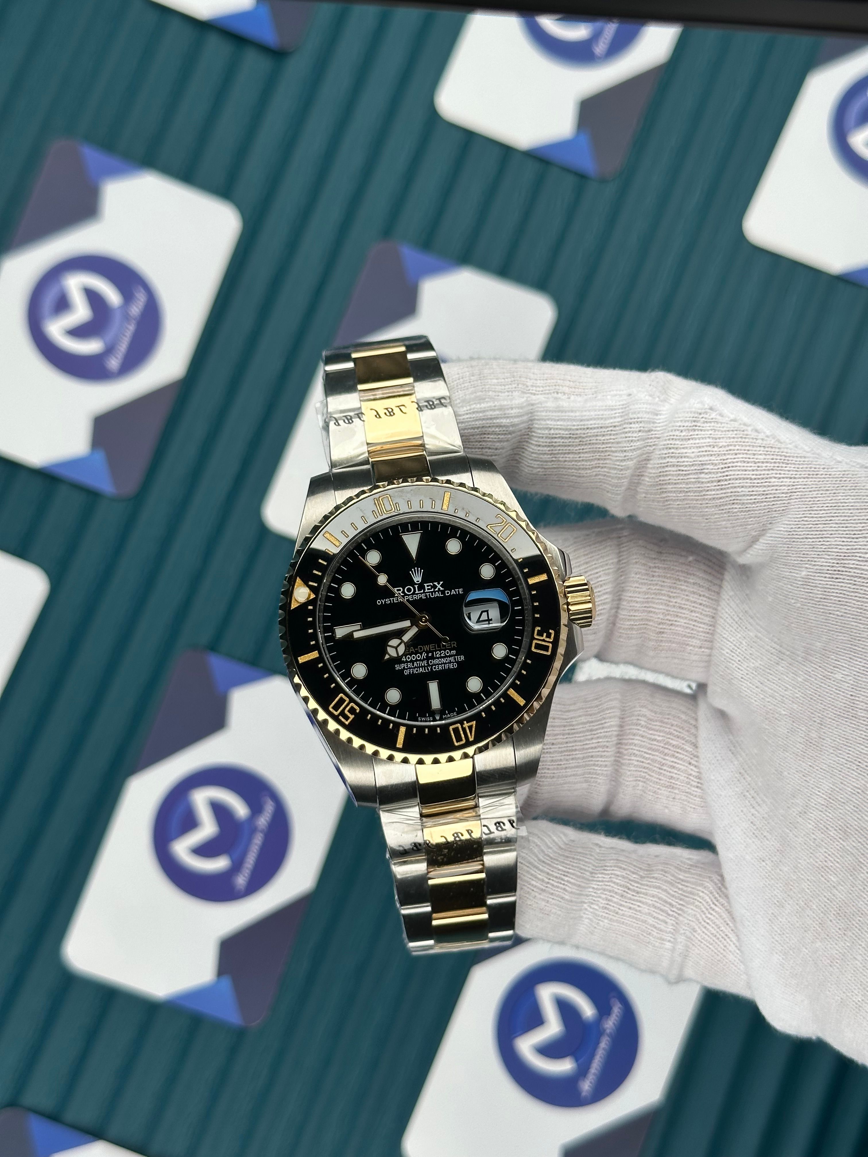 ROLEX SEA DWELLER BLACK DIAL GOLD-SILVER OYSTER