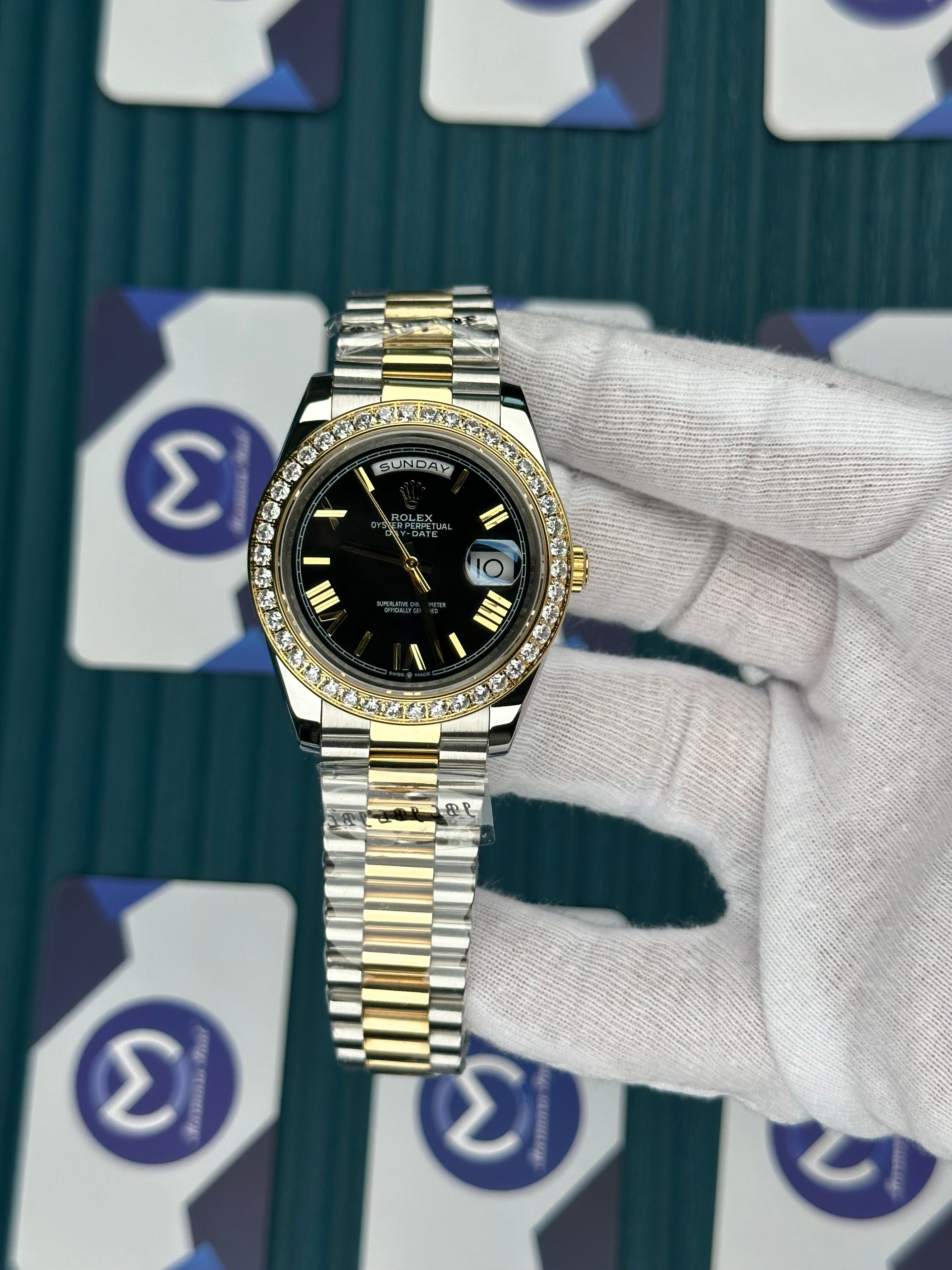 ROLEX DAY-DATE BLACK DIAL ROMA INDEX DIAMOND BEZEL GOLD-SILVER PRESIDENT