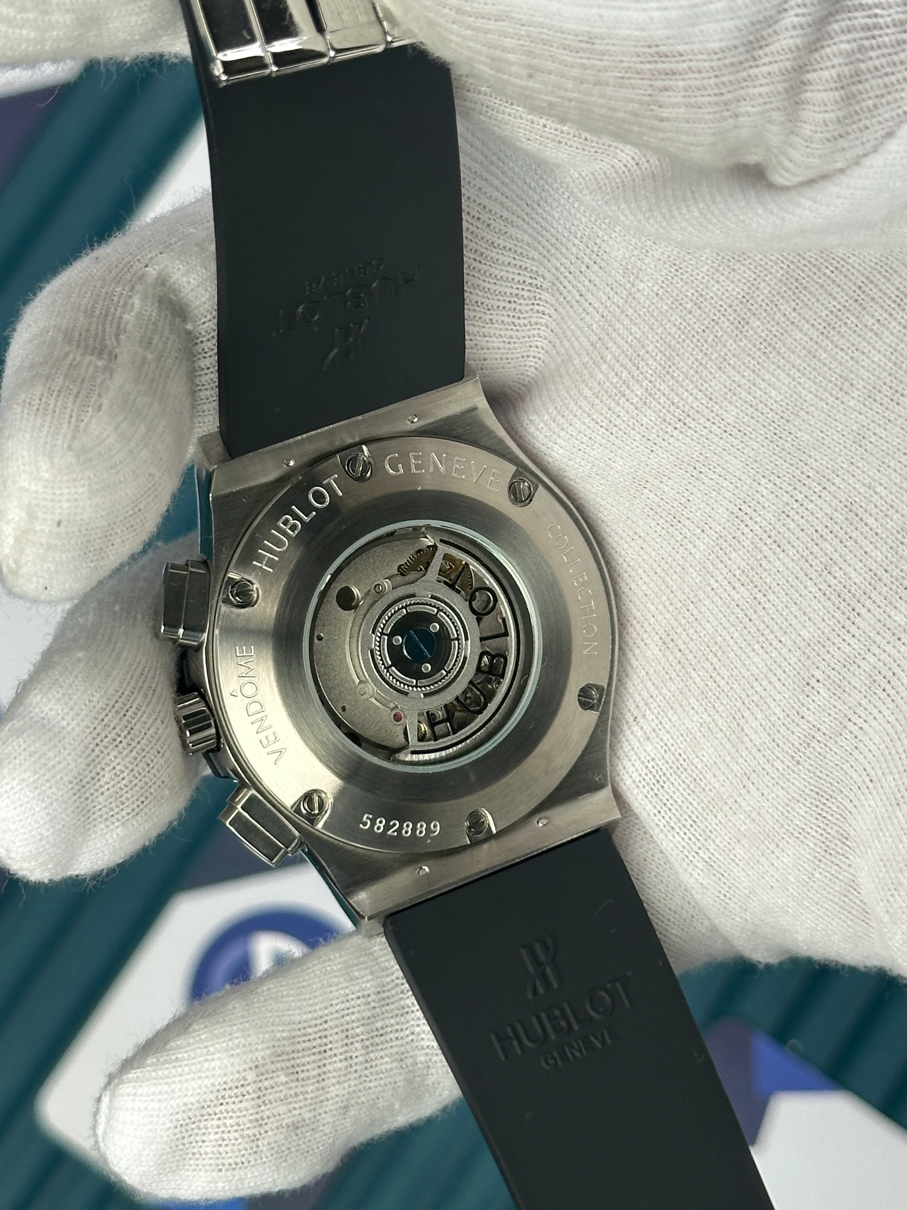 HUBLOT AUTOMATIC SKELETON DIAL DIAMOND BEZEL SILVER CASE BLACK RUBBER CORD 