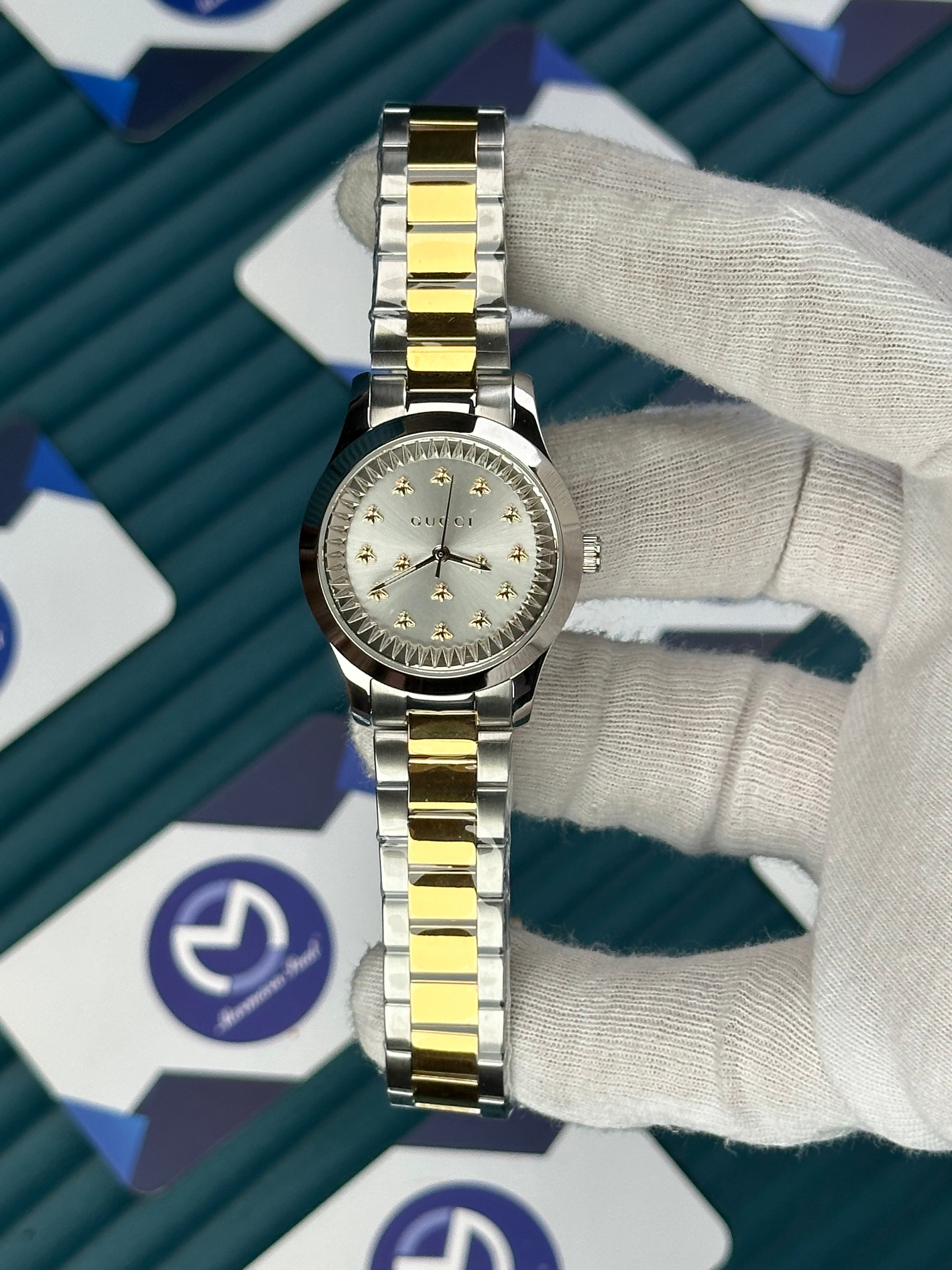 GUCCI WOMAN WHITE DIAL BUTTERFLY MOTIF GOLD-SILVER