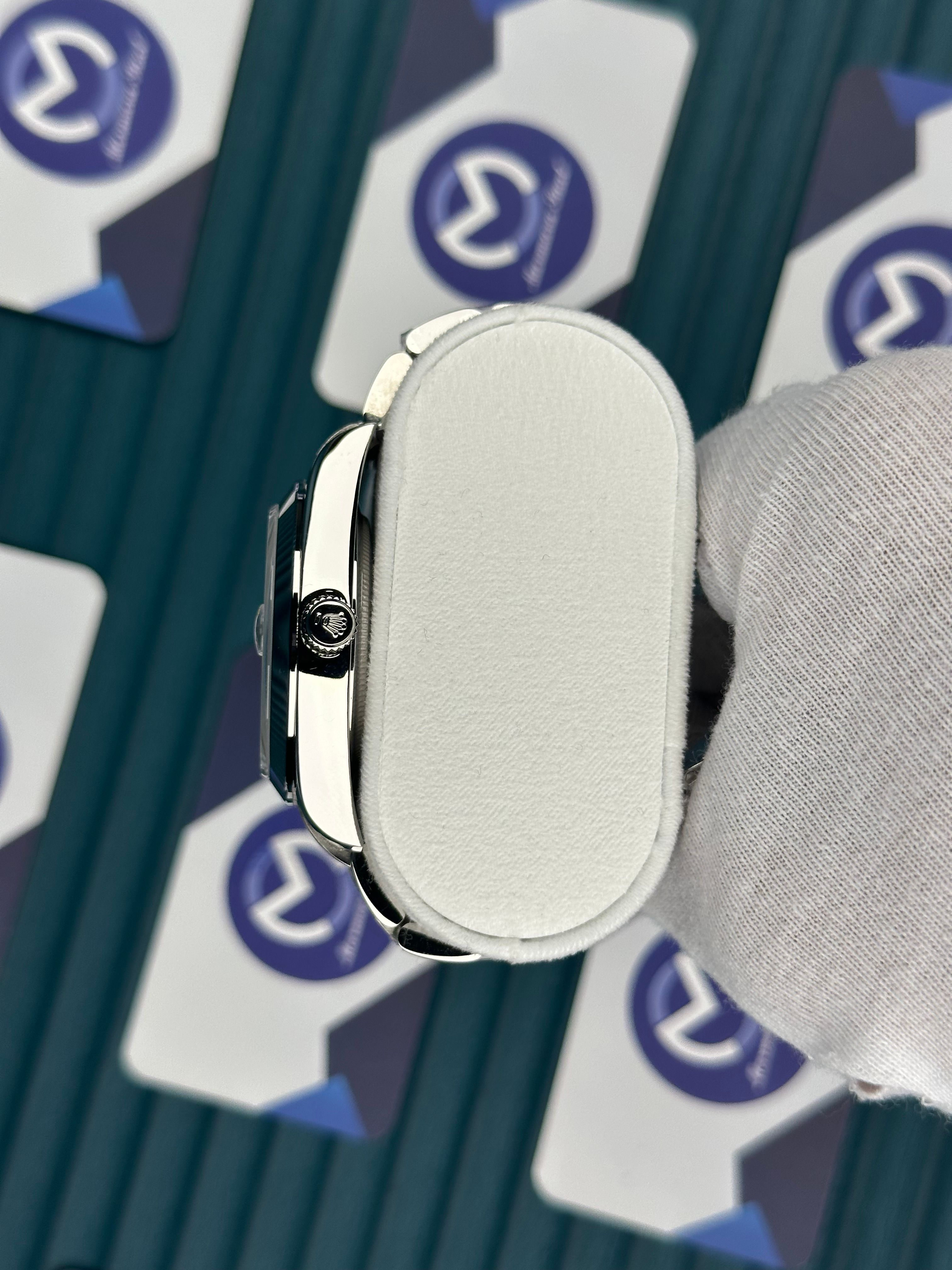 ROLEX DATEJUST BLUE DIAL OVAL BEZEL DIAMOND INDEX SILVER OYSTER
