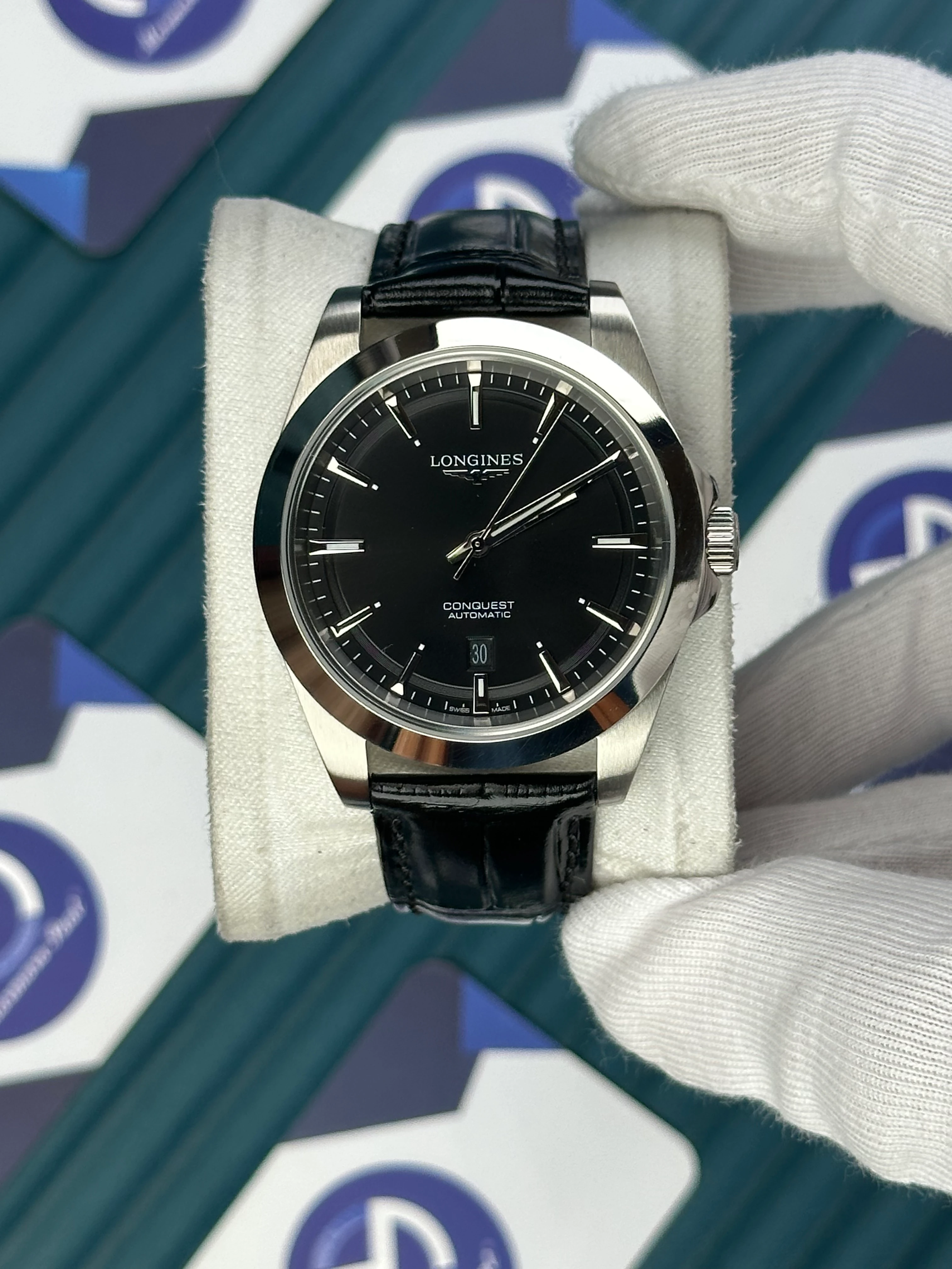 LONGINES CONQUEST AUTOMATIC BLACK DIAL SILVER CASE BLACK LEATHER 