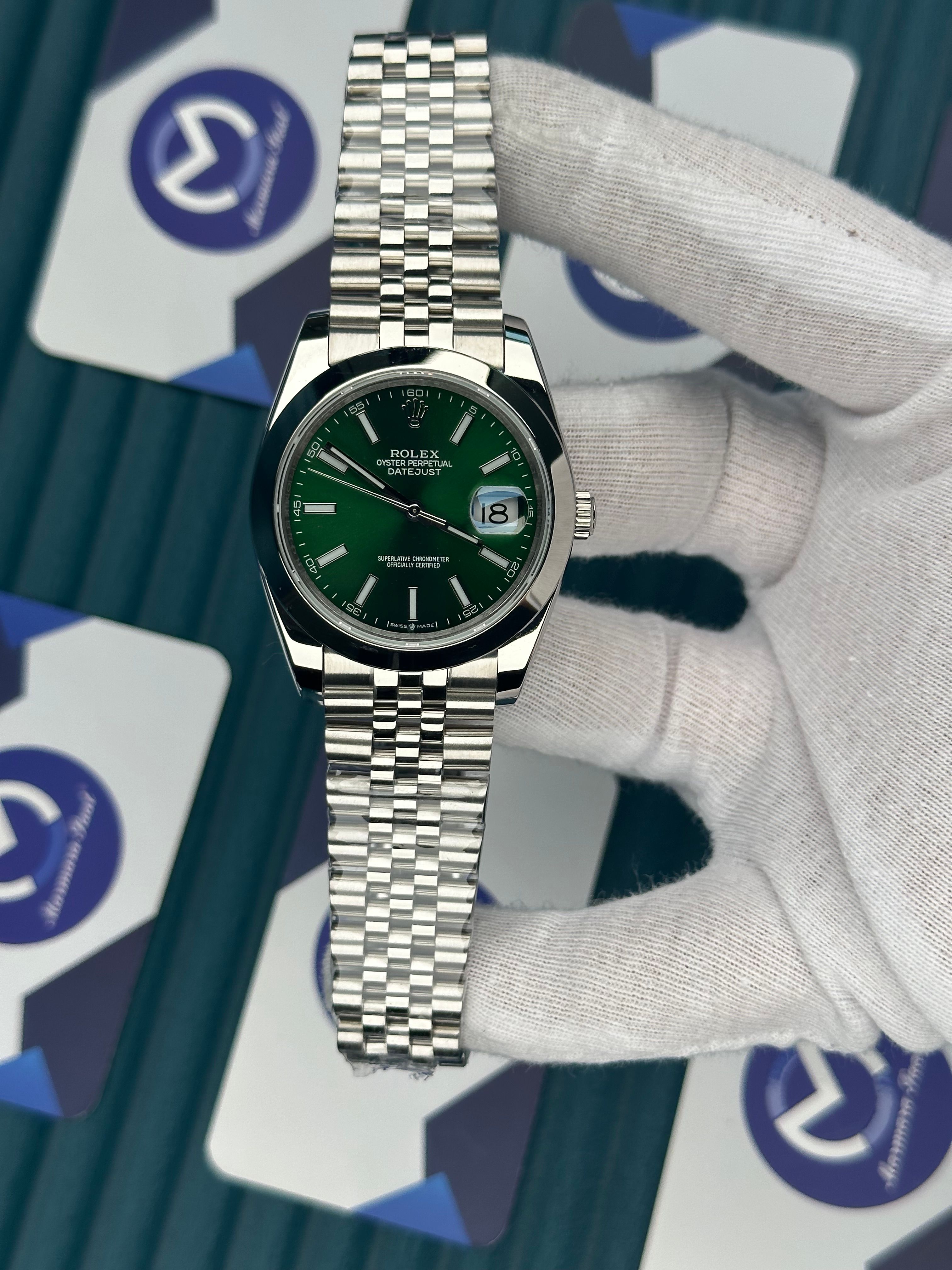 ROLEX DATEJUST GREEN DIAL OVAL BEZEL SILVER JUBILE