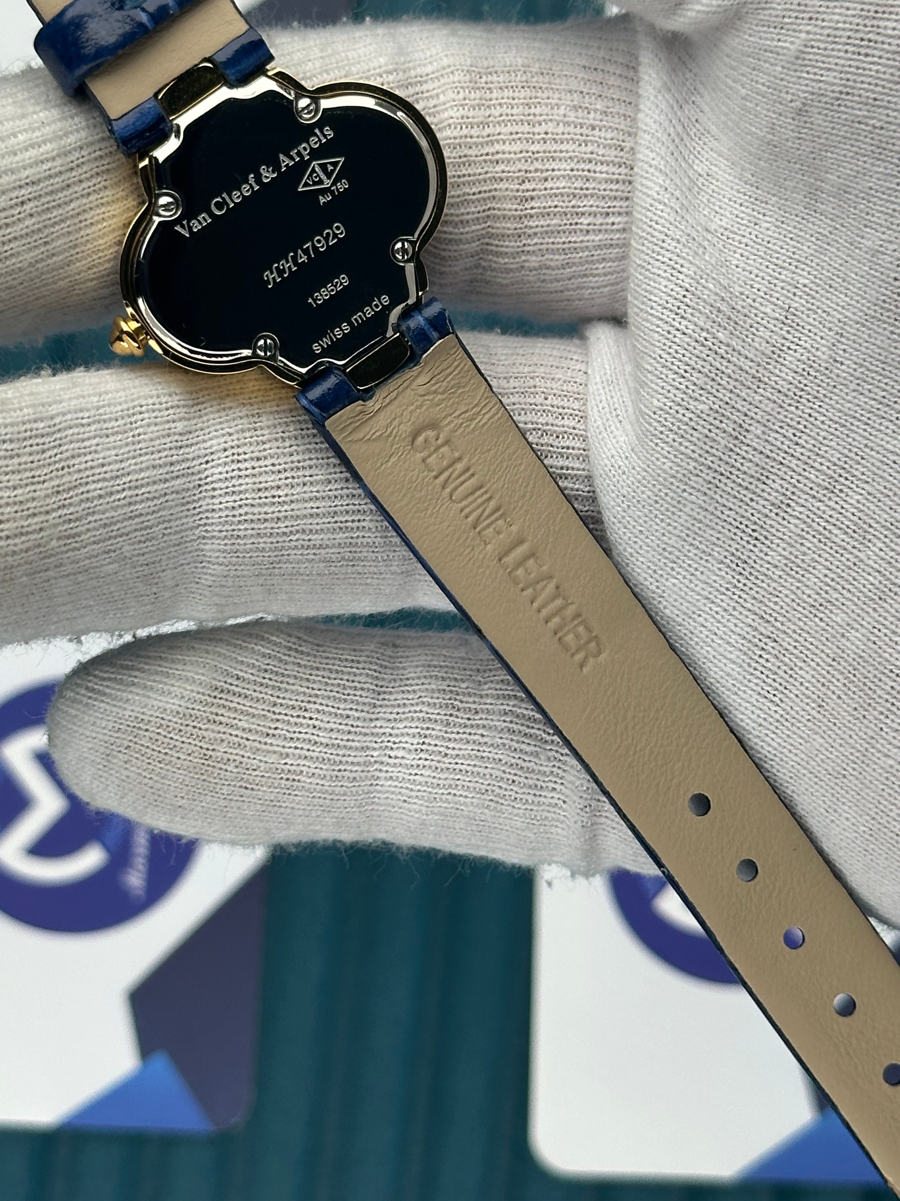 VAN CLEEF & ARPELS WHITE DIAL DIAMOND BEZEL GOLD CASE BLUE LEATHER CORD