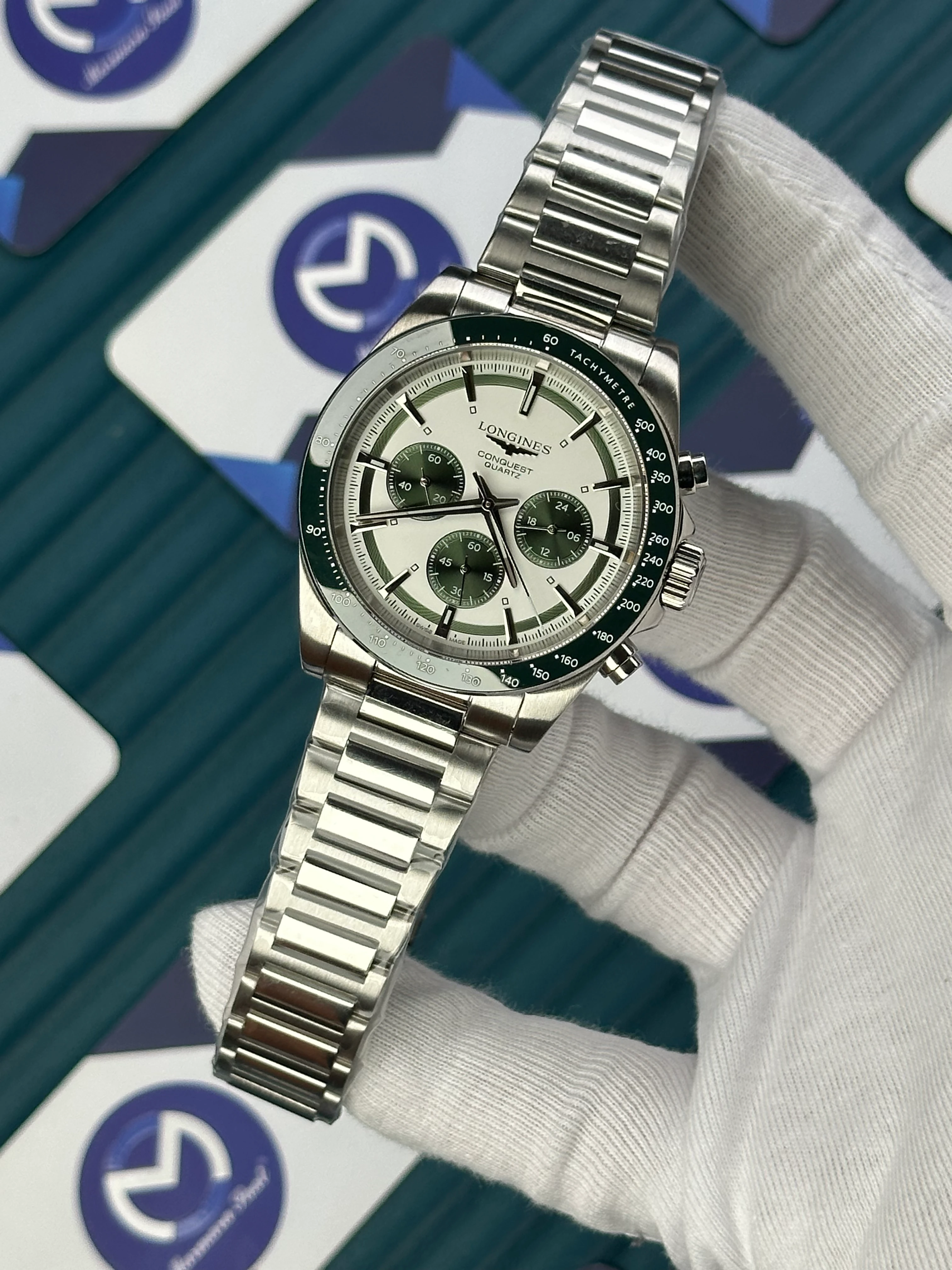 LONGINES CONQUEST CHRONOGRAPH AUTOMATIC WHITE DIAL GREEN BEZEL SILVER 