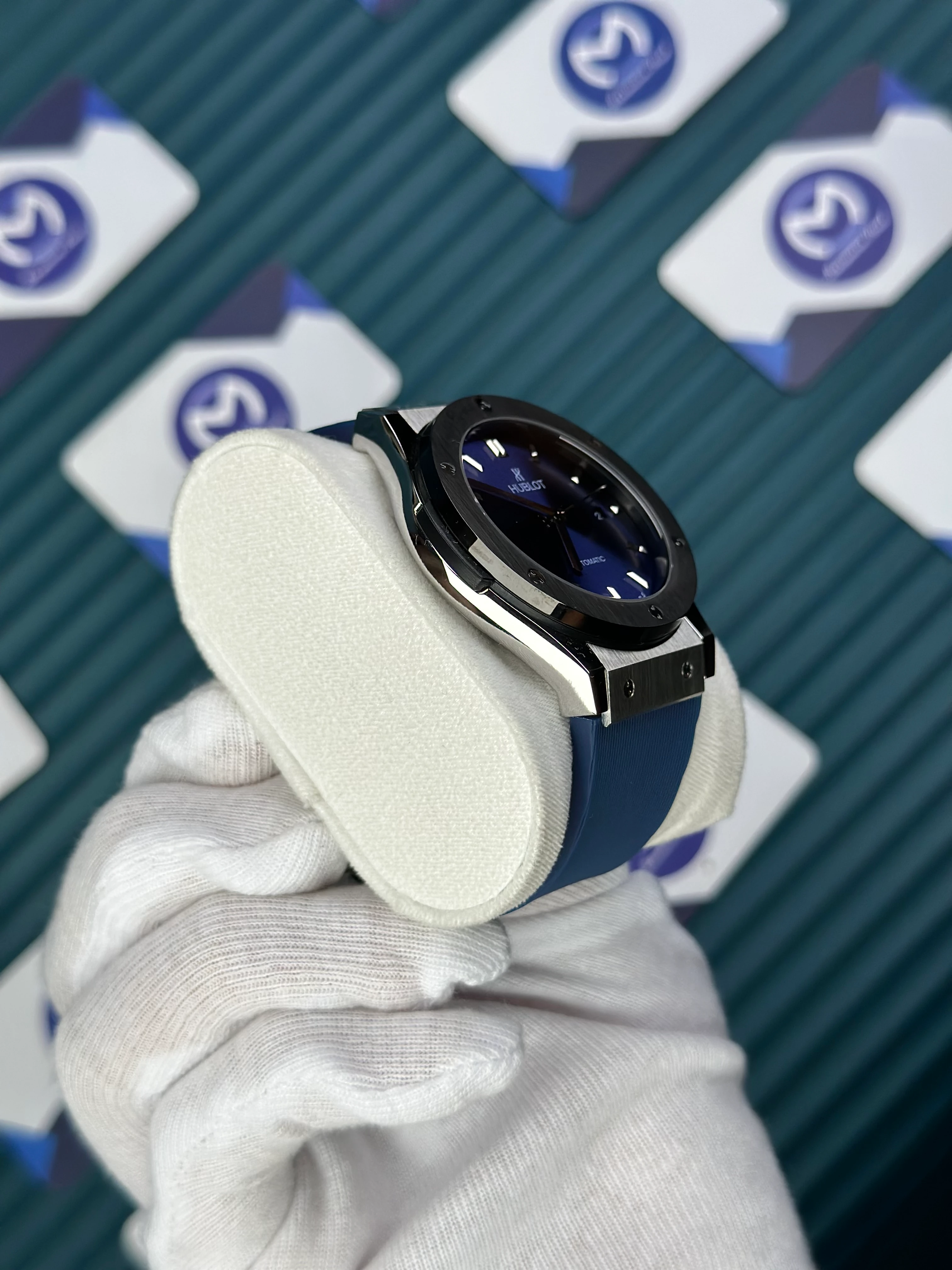 HUBLOT GENEVE AUTOMATIC VENDOME BLUE DIAL SILVER CASE BLACK BEZEL BLUE RUBBER CORD