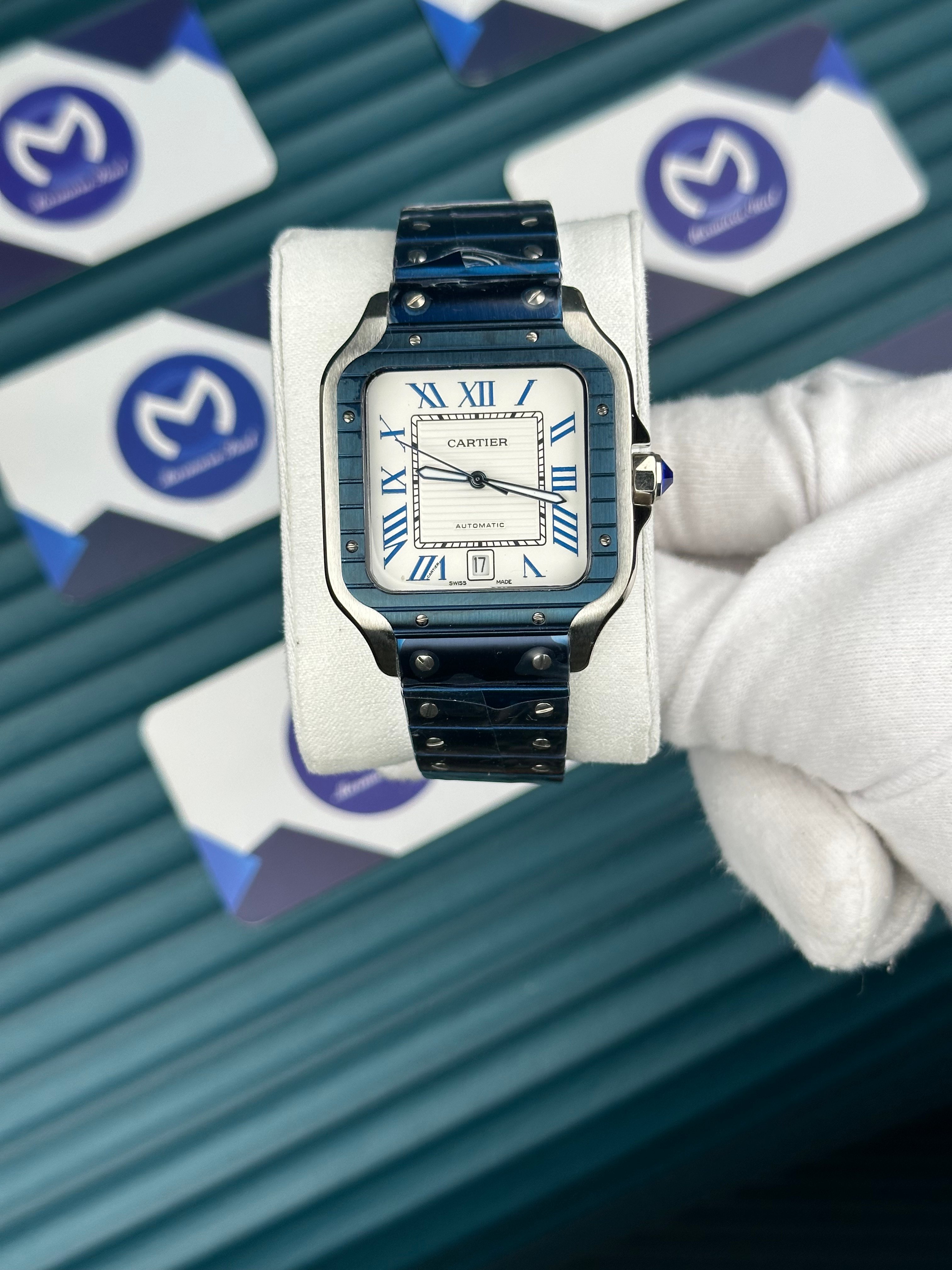 Cartier Santos Mavi Kordon Beyaz Kadran