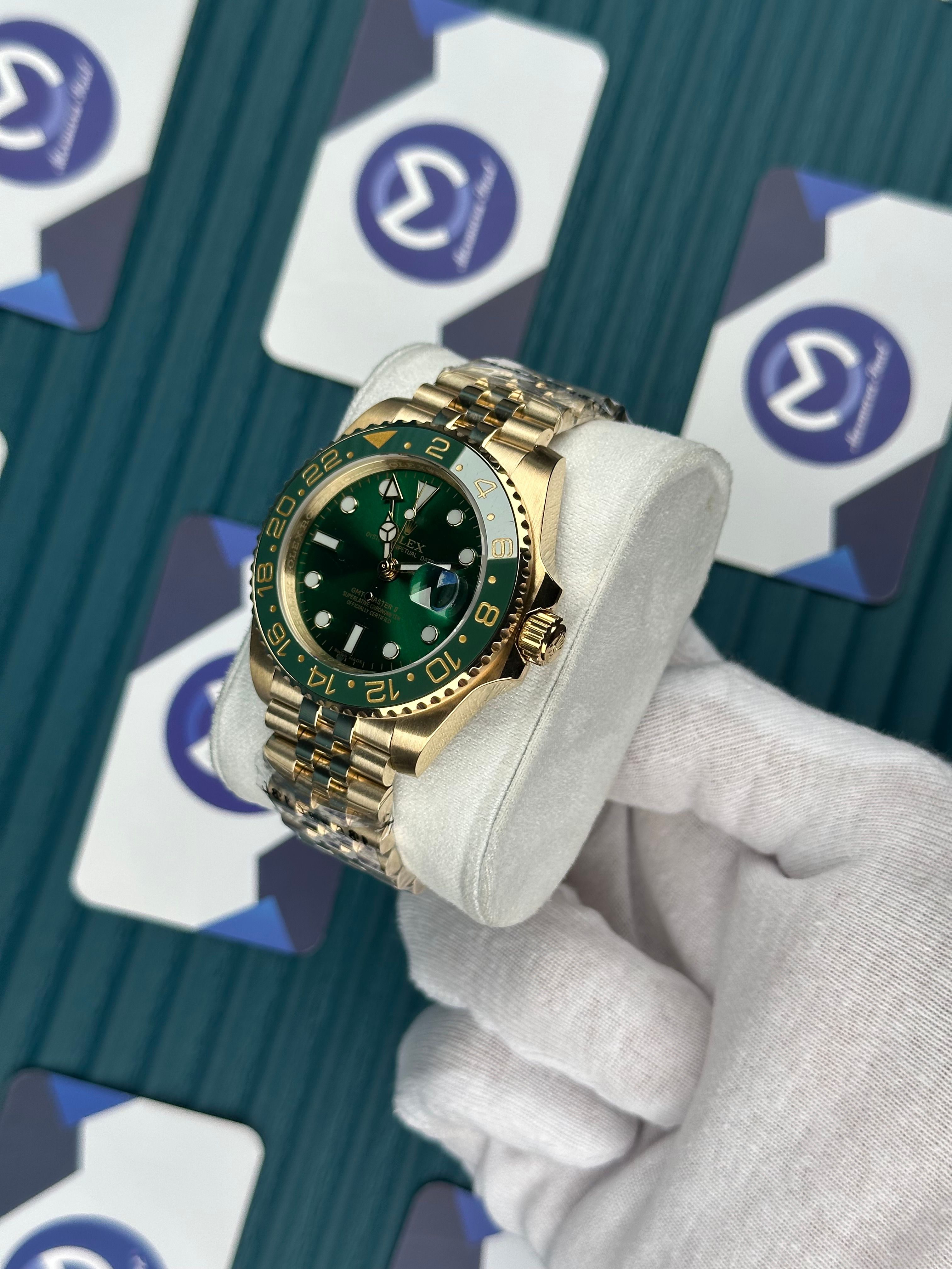 ROLEX GMT MASTER II GREEN DIAL GOLD JUBILE
