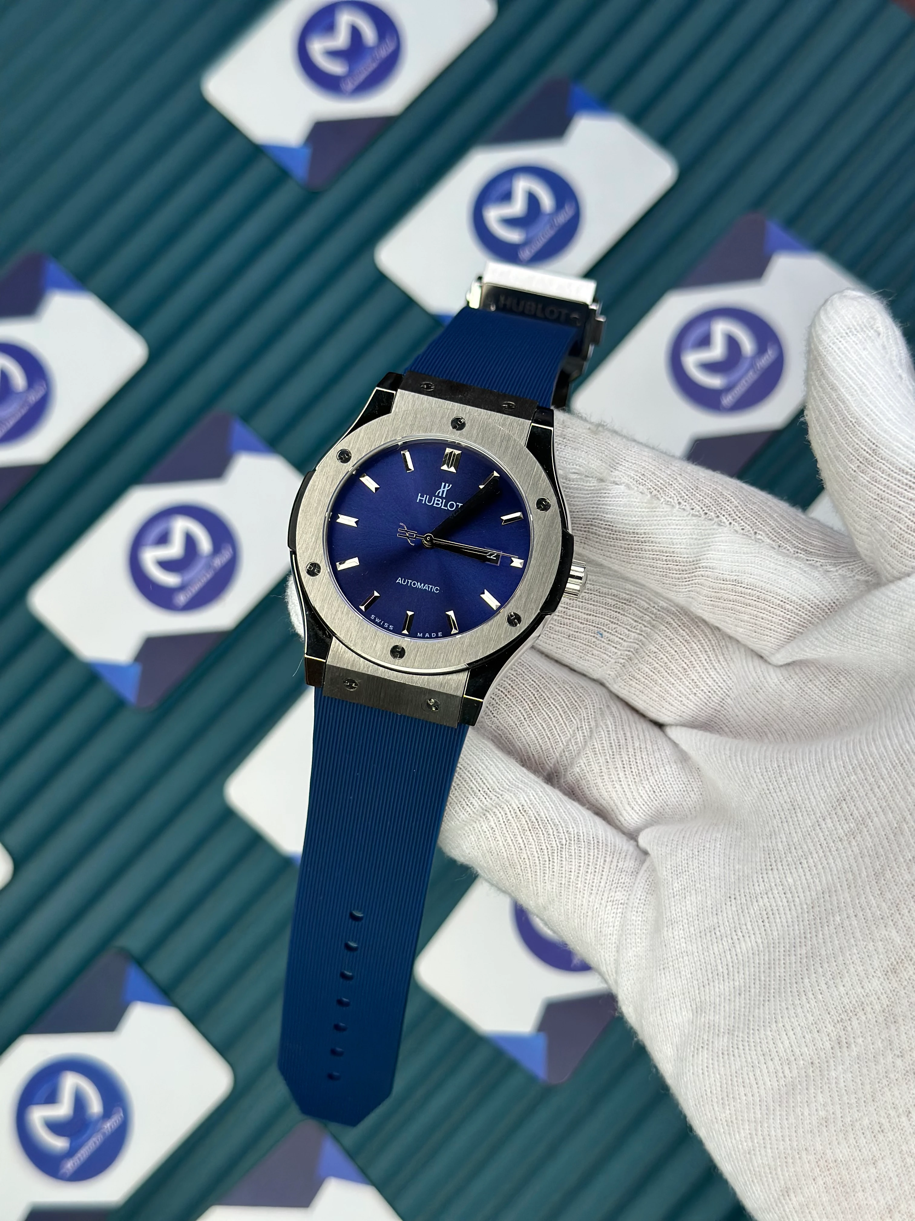 HUBLOT GENEVE AUTOMATIC BLUE DIAL SILVER CASE BLUE RUBBER CORD 