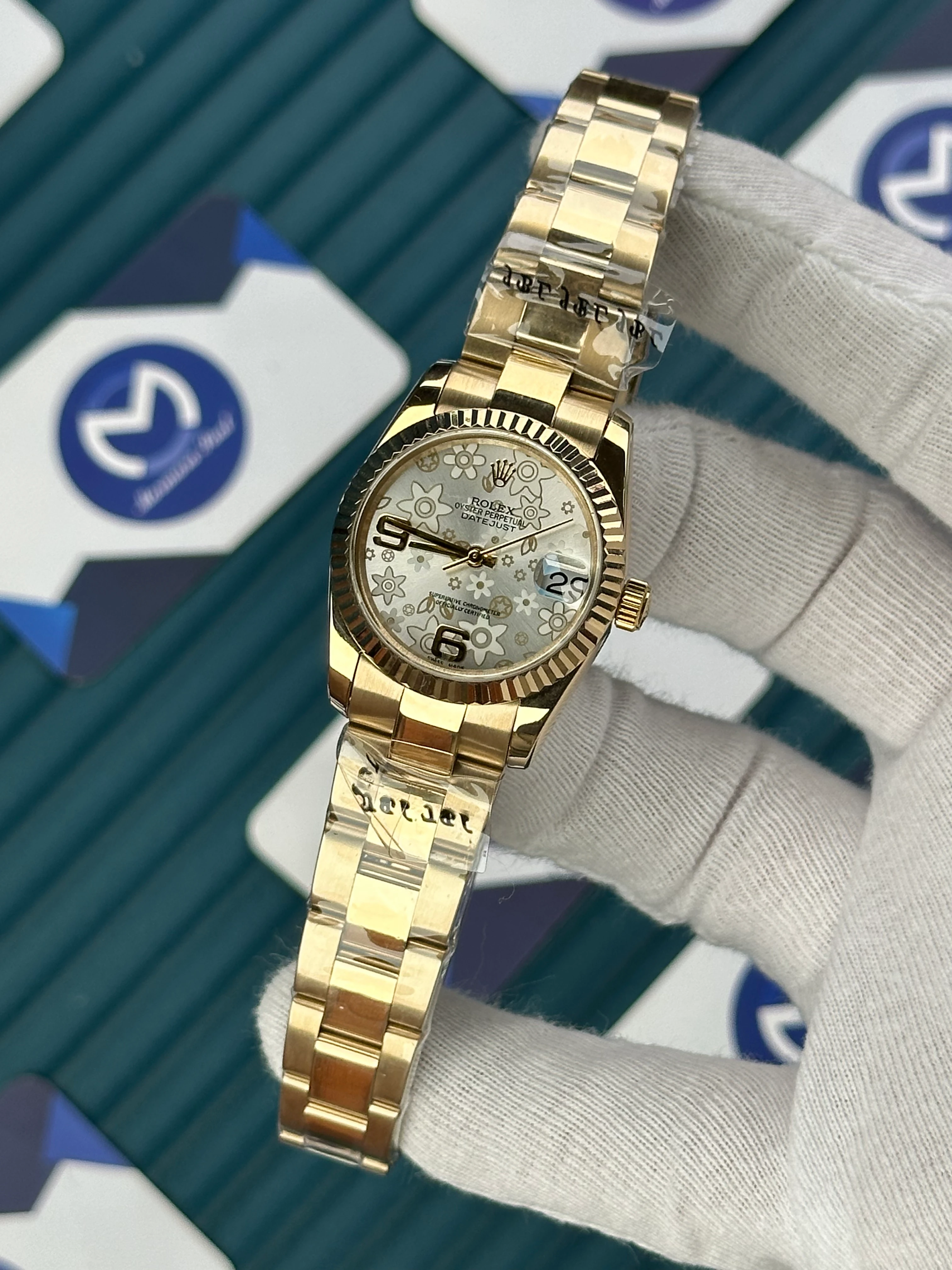 ROLEX 31 MM DATEJUST WHITE FLOWERS PATTERNED DIAL GOLD OYSTER 