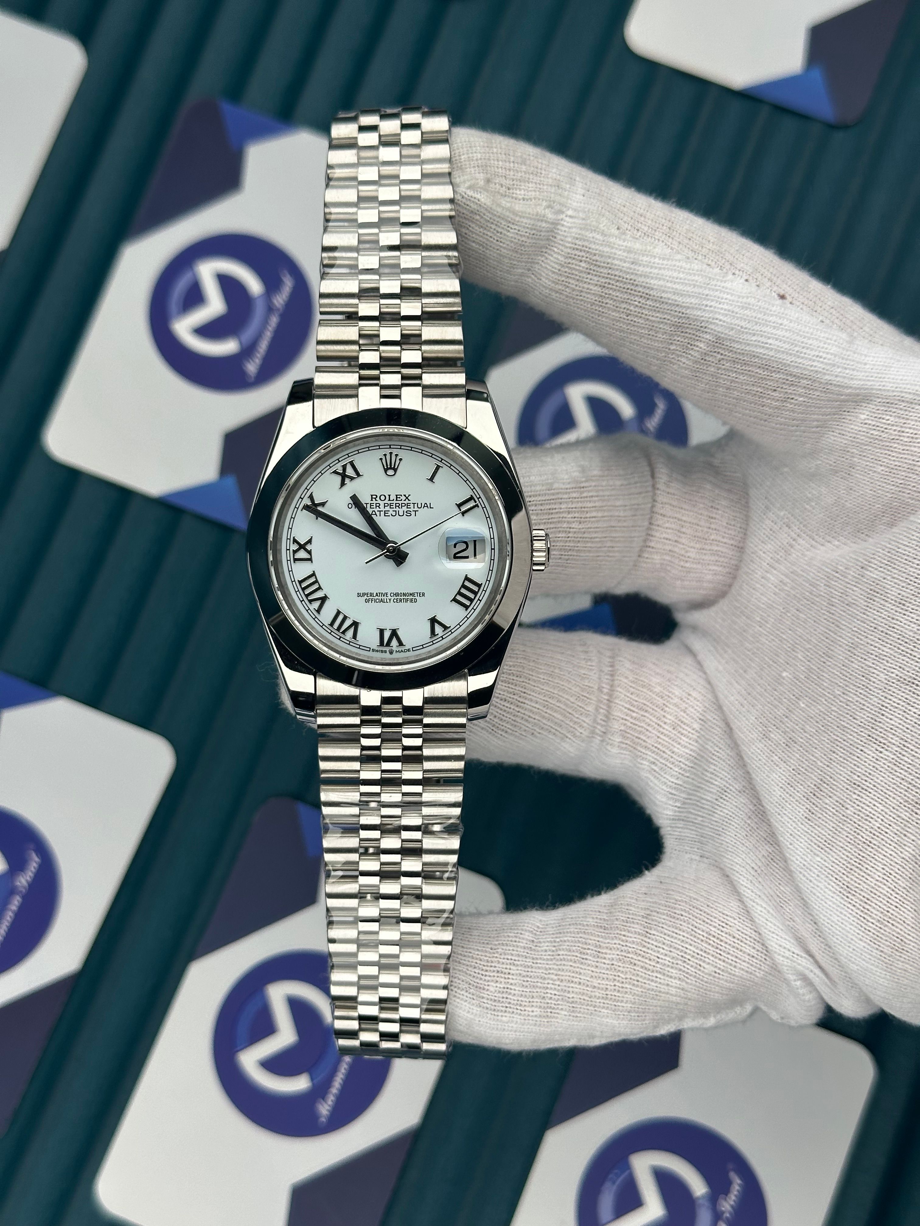 ROLEX DATEJUST WHITE DIAL OVAL BEZEL SILVER ROMA INDEX SILVER JUBILE