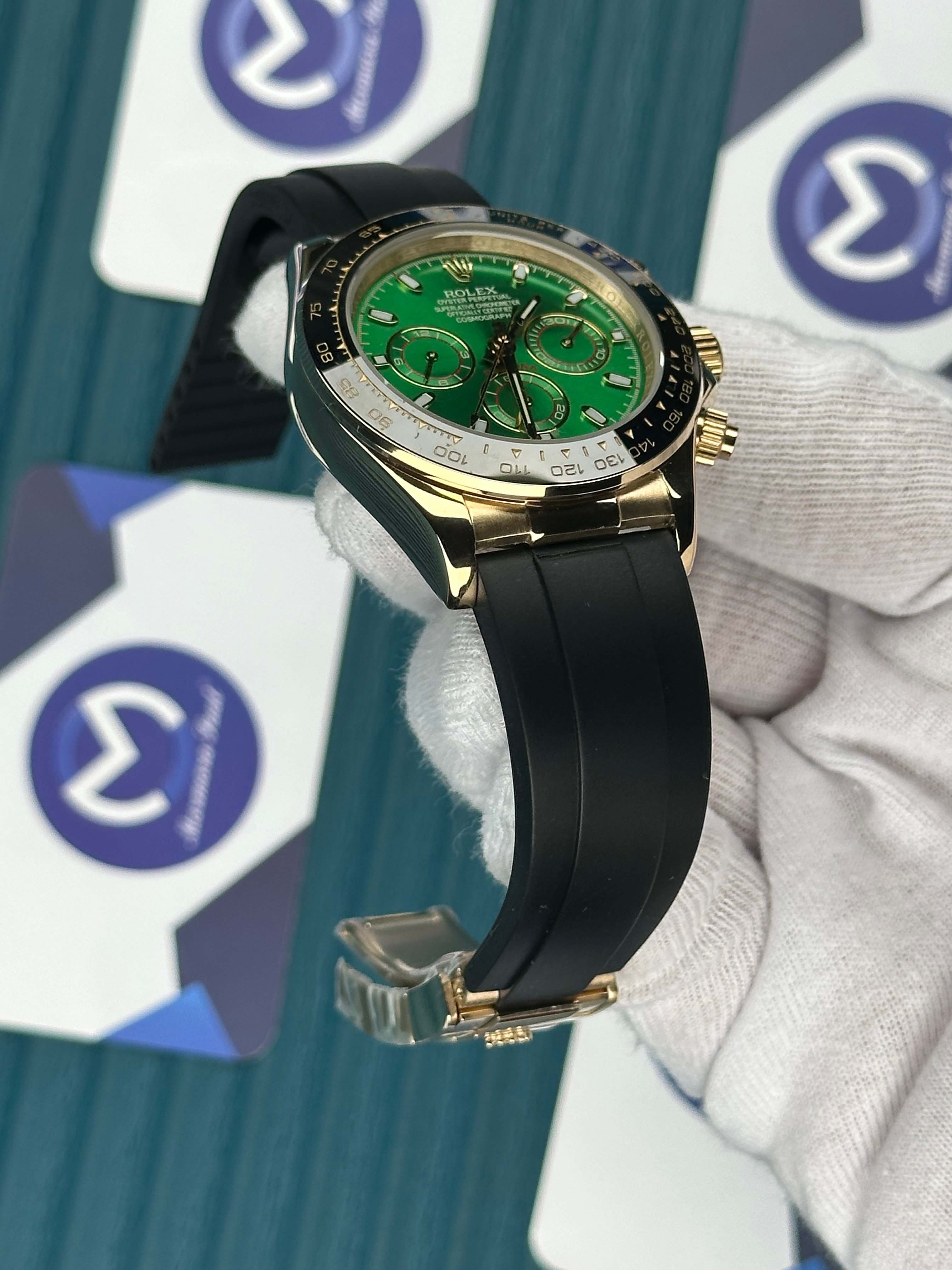 ROLEX DAYTONA GREEN DIAL GOLD CASE OYSTERFLEX