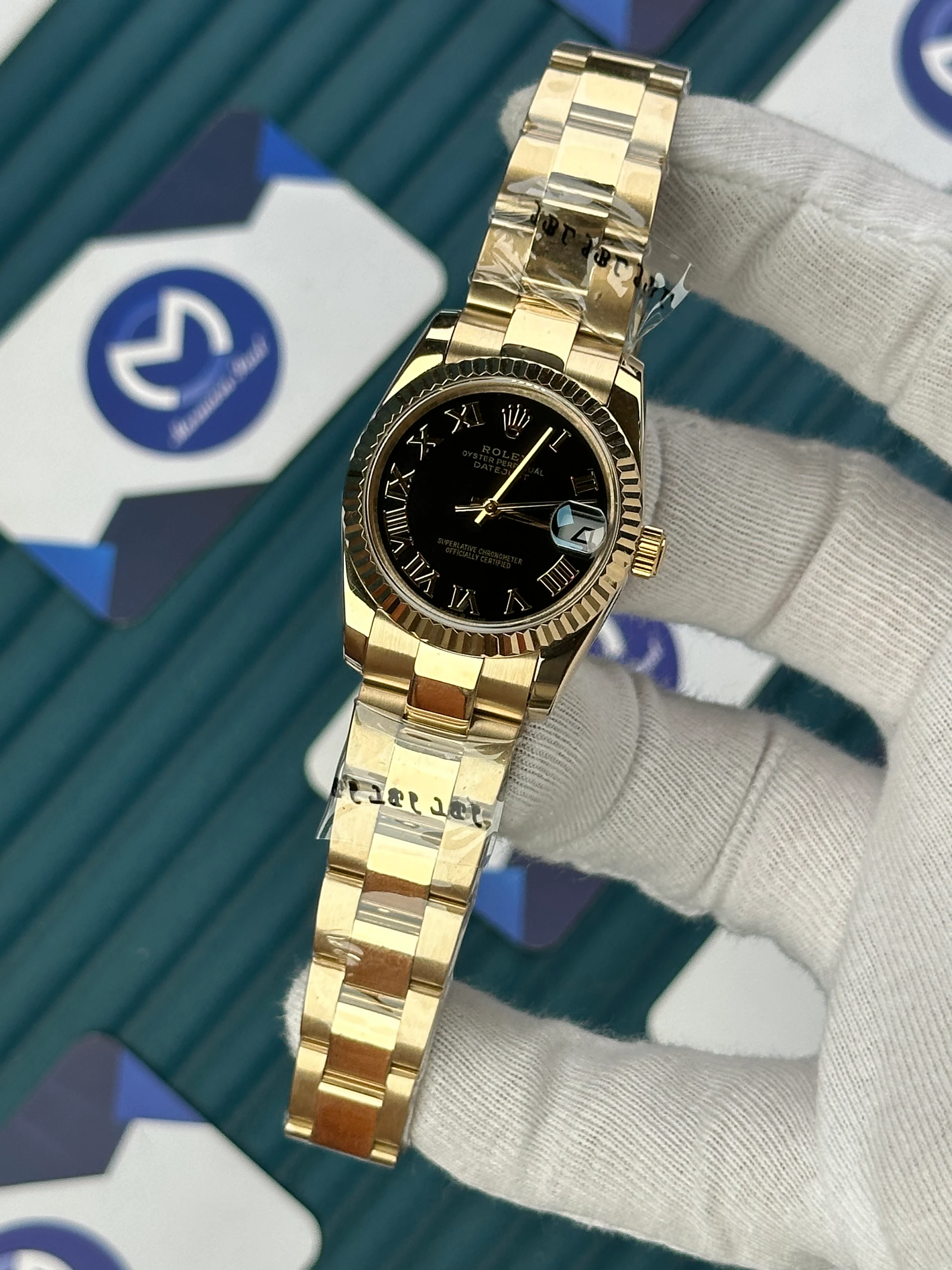 ROLEX 31 MM DATEJUST BLACK DIAL ROMA INDEX GOLD OYSTER 