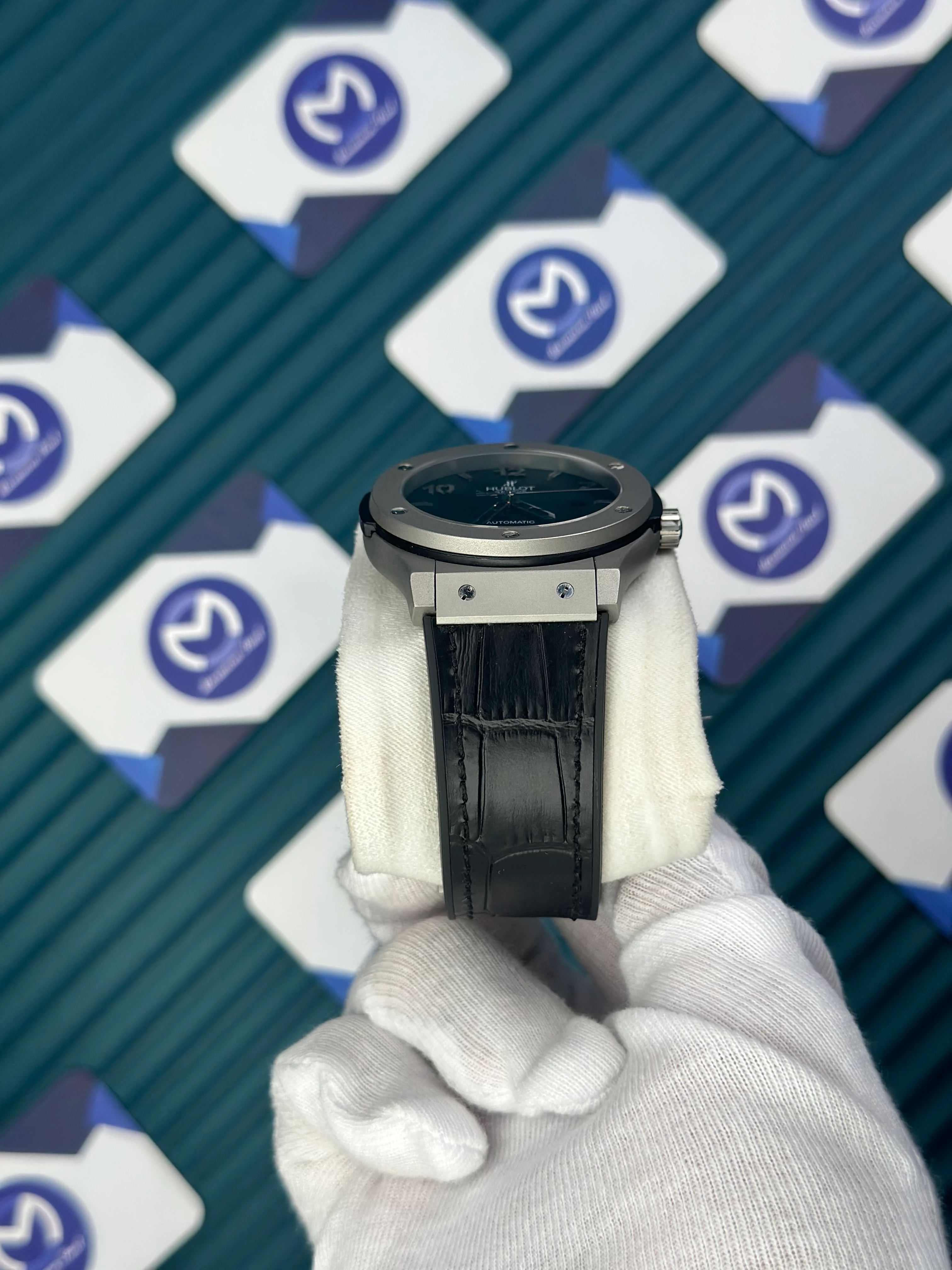 HUBLOT GENEVE AUTOMATIC BLACK DIAL GREY CASE BLACK LEATHER CORD 