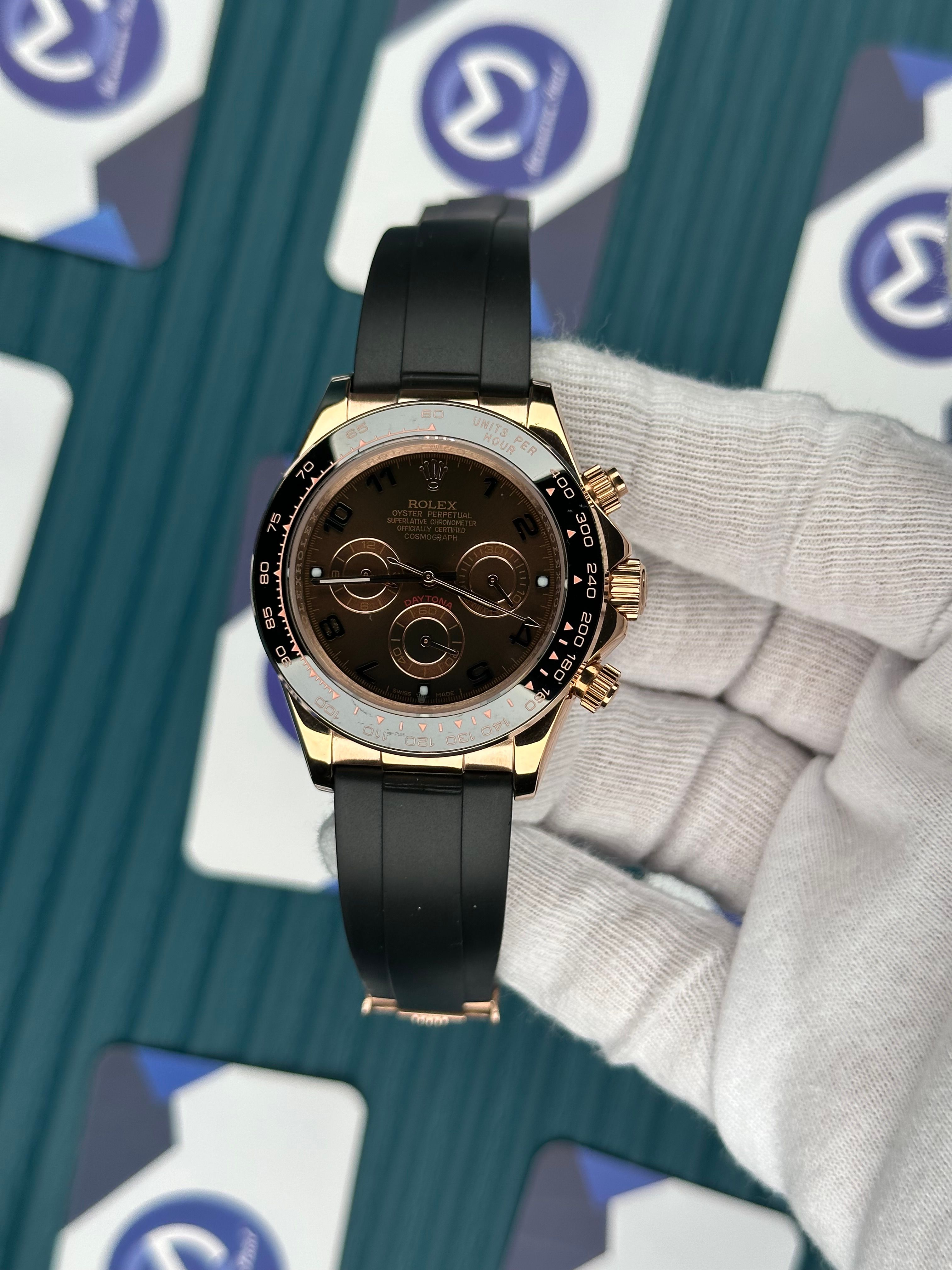 ROLEX DAYTONA CHOCOLATE DIAL ROSE CASE OYSTERFLEX