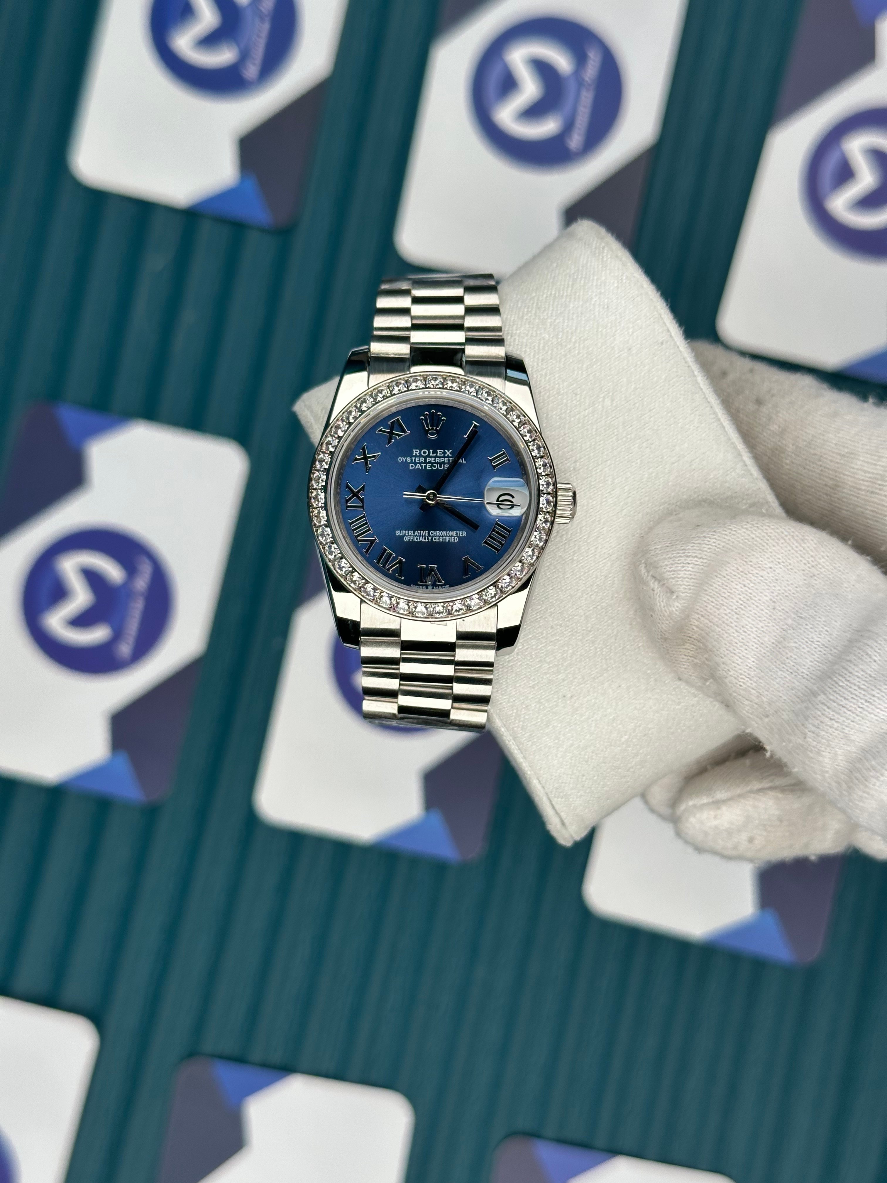 ROLEX 31 BLUE DIAL DIAMOND BEZEL SILVER PRESIDENT