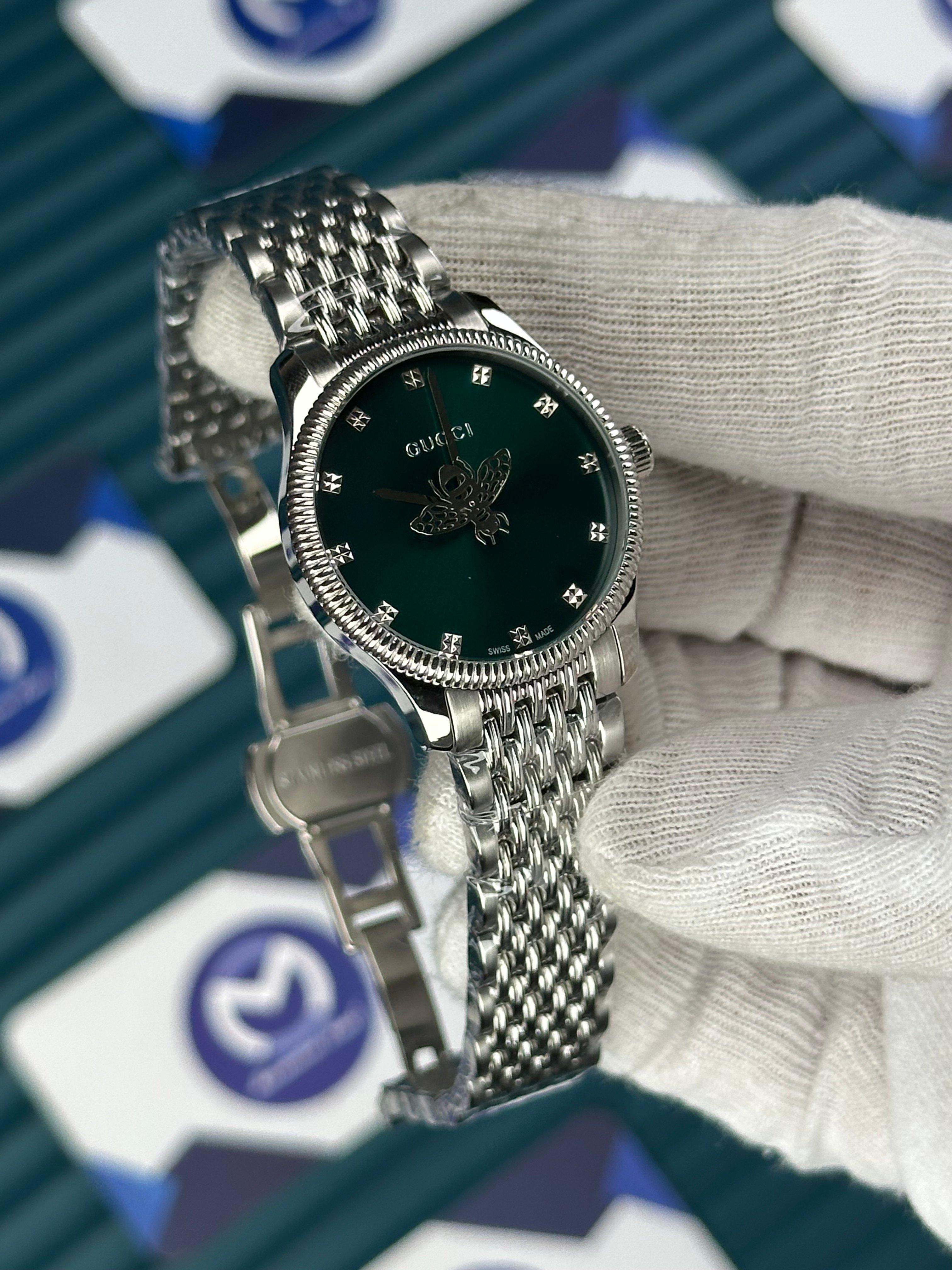 GUCCI GREEN DIAL SPINNING BUTTERFLY SILVER