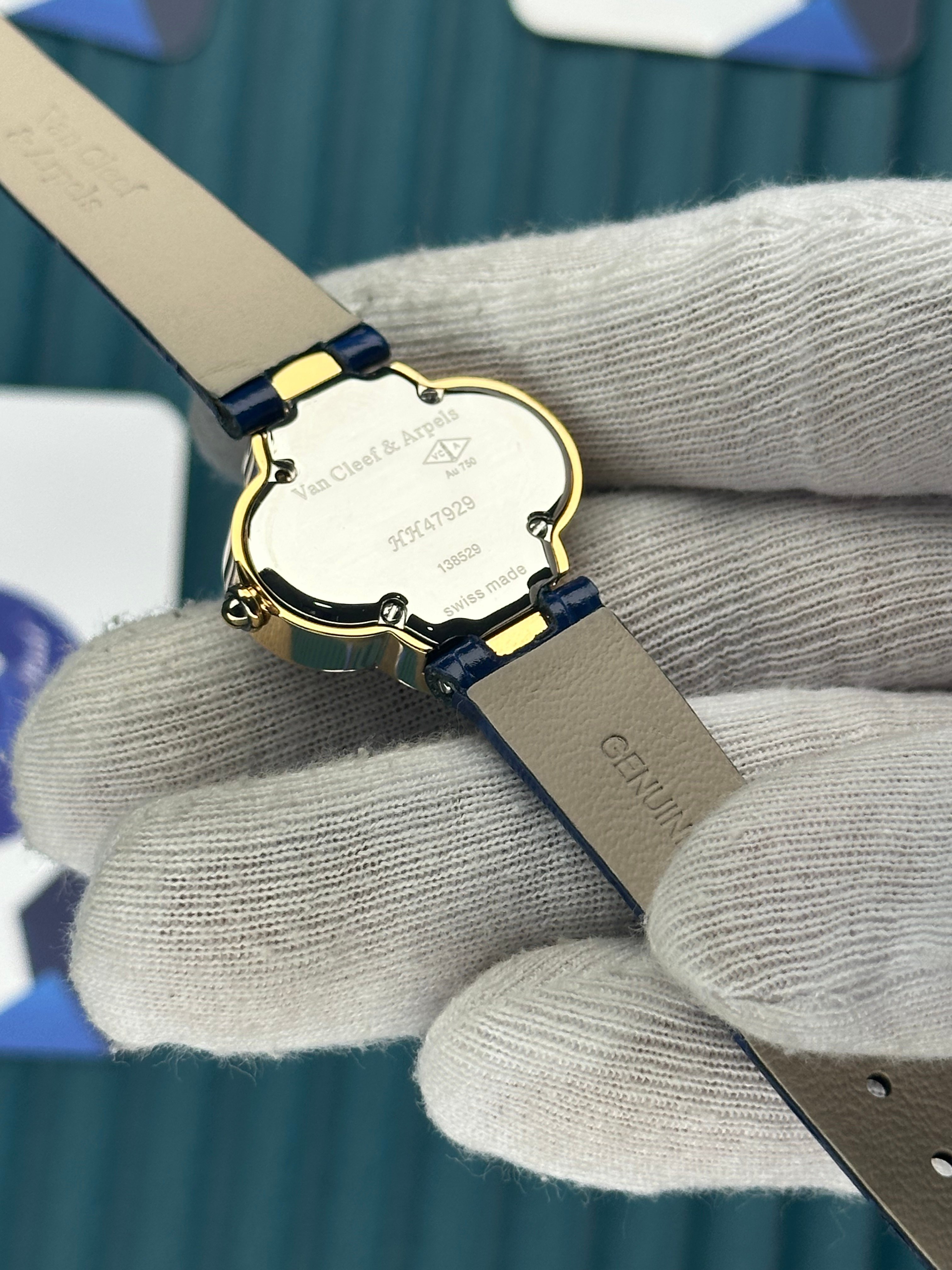VAN CLEEF & ARPELS WHITE DIAL DIAMOND BEZEL GOLD CASE WHITE LEATHER CORD