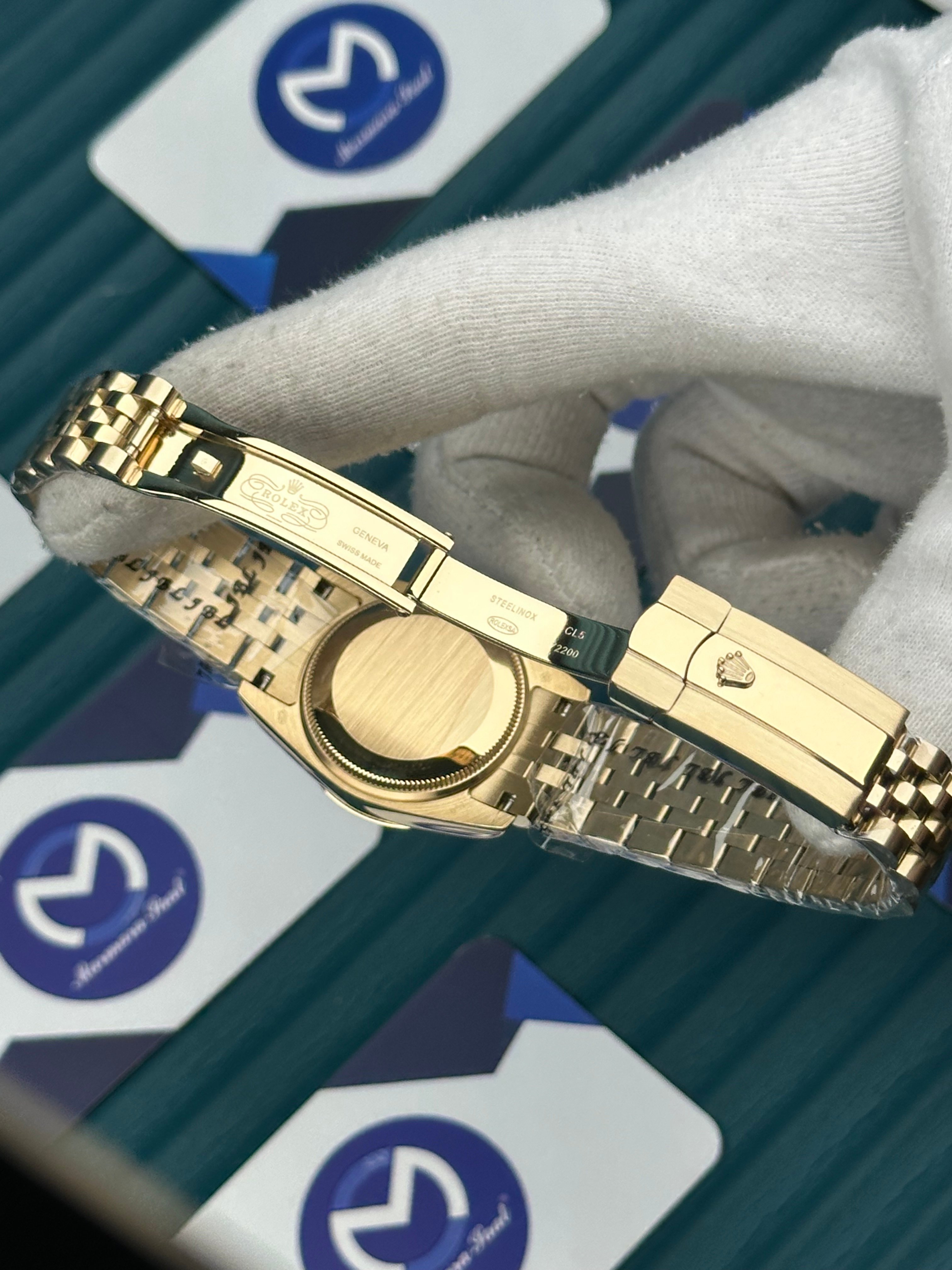ROLEX 31 BLACK DIAL DIAMOND INDEX GOLD JUBILEE