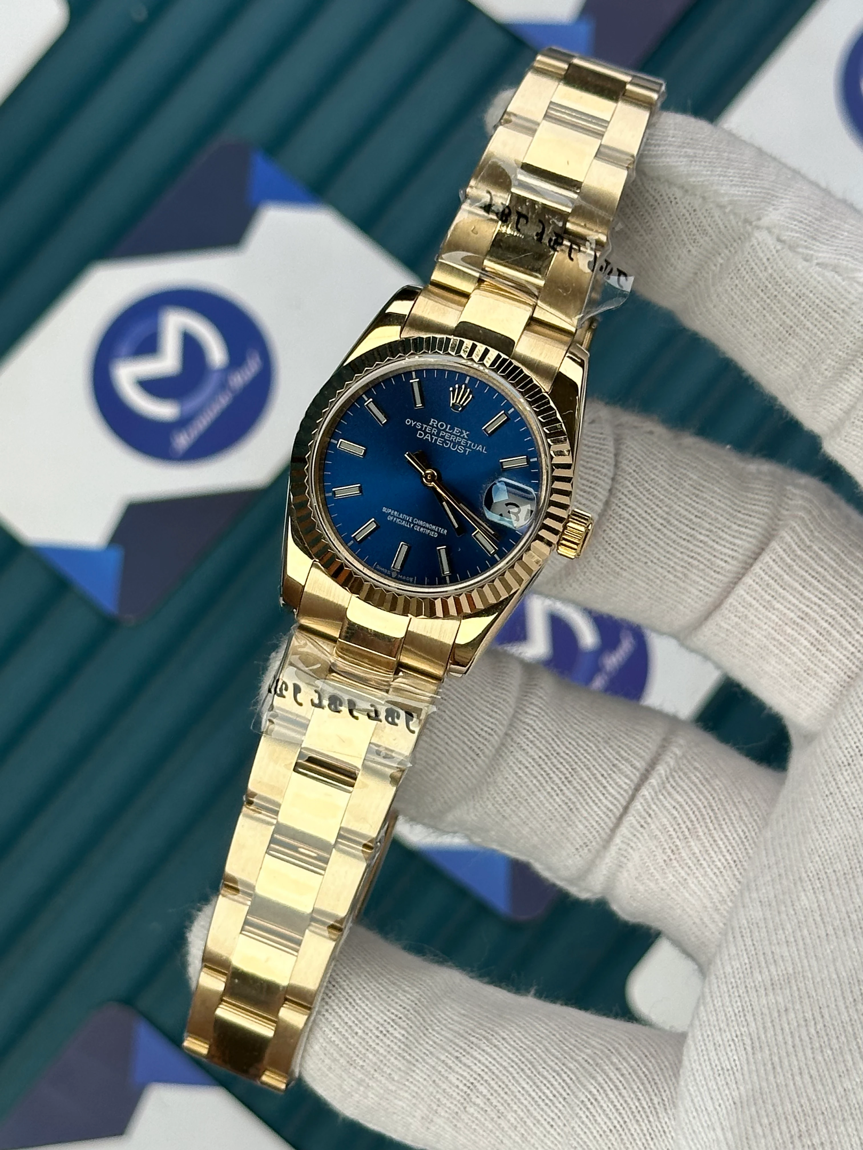 ROLEX 31 MM DATEJUST BLUE DIAL ROD INDEX GOLD OYSTER 