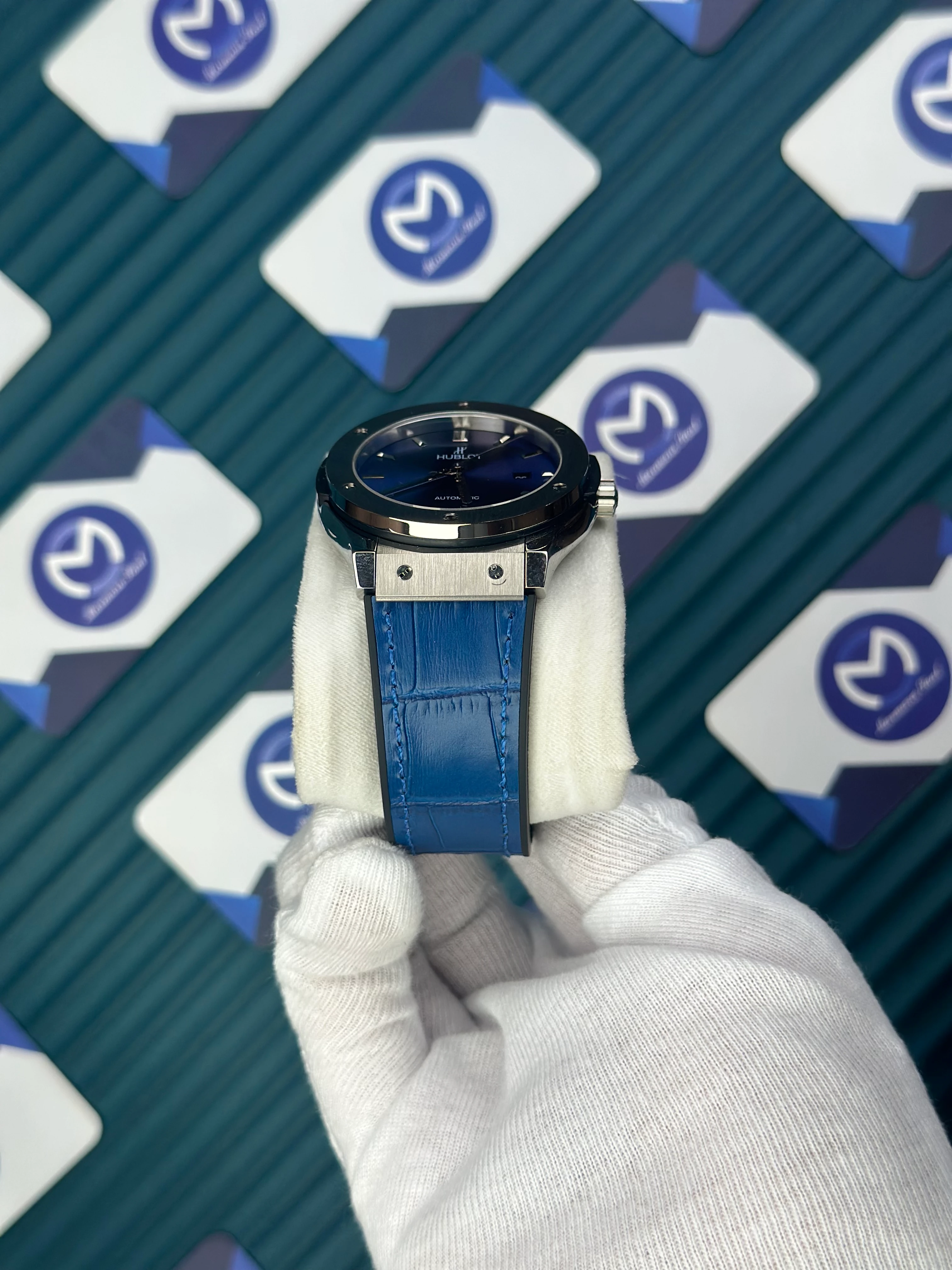 HUBLOT GENEVE AUTOMATIC VENDOME BLUE DIAL SILVER CASE BLUE LEATHER CORD 