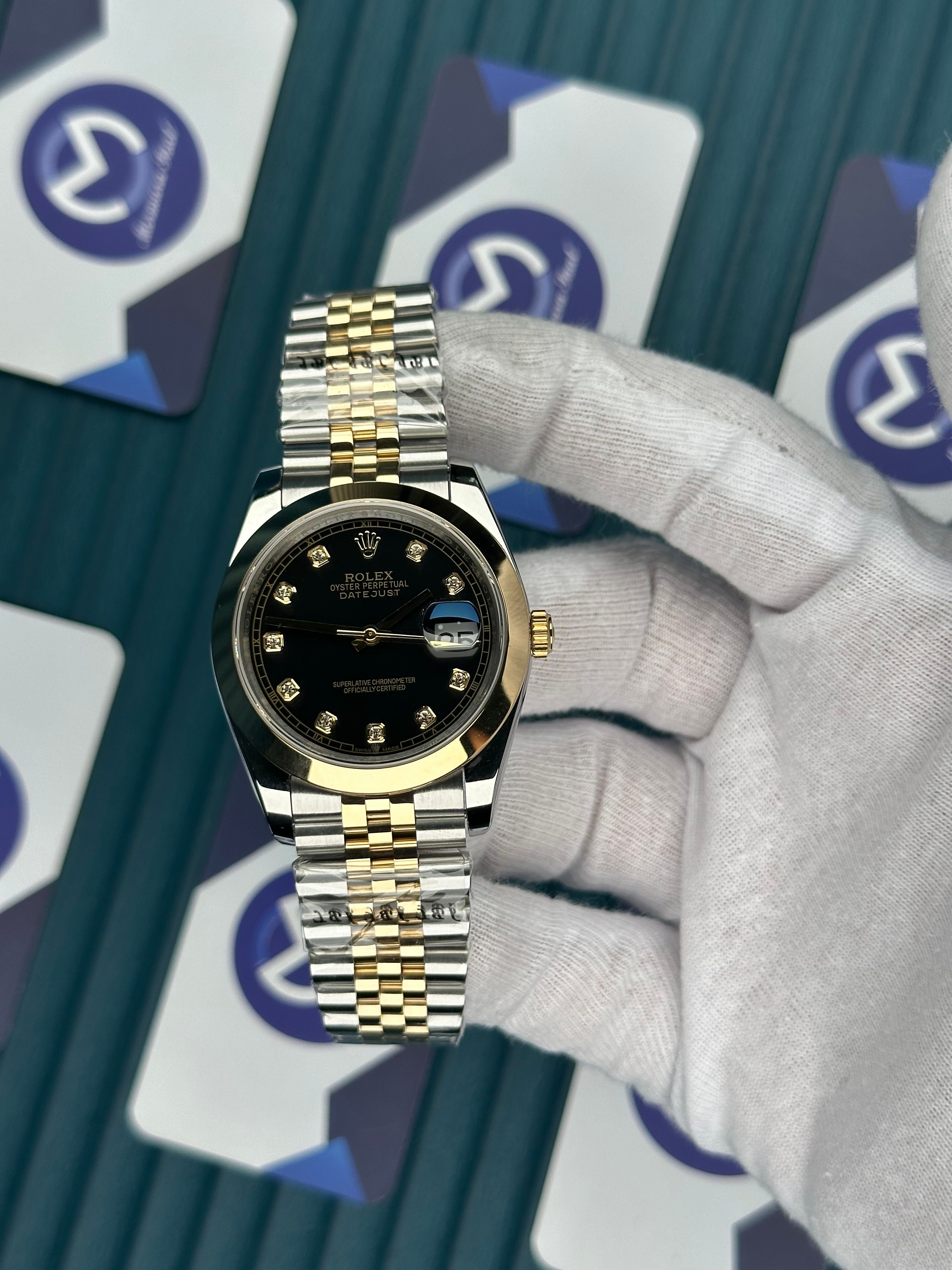 ROLEX DATEJUST OVAL BEZEL BLACK DIAL DIAMOND INDEX GOLD-JUBILE