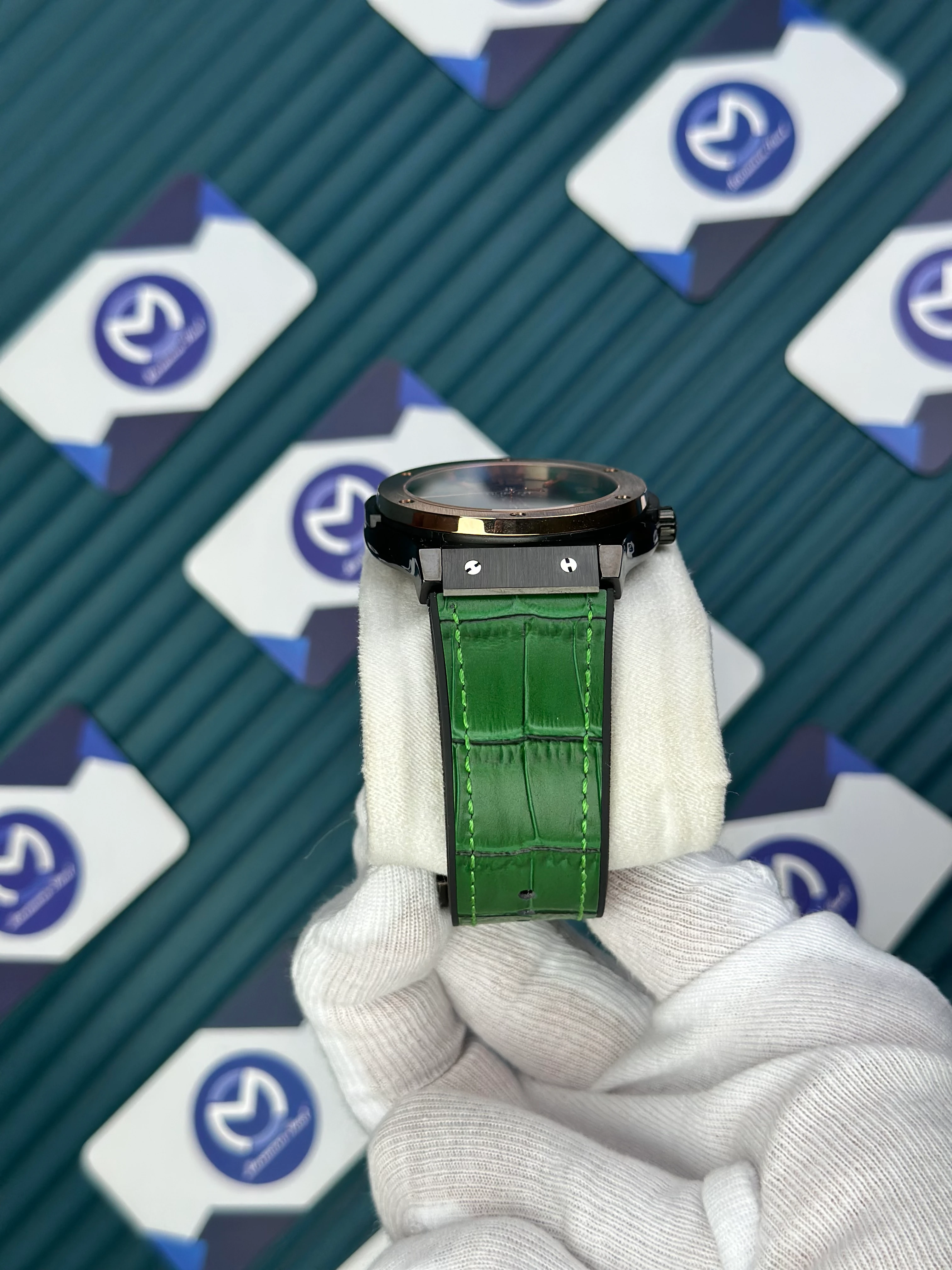 HUBLOT GENEVE AUTOMATIC GREEN DIAL ROSE BEZEL BLACK CASE GREEN LEATHER CORD