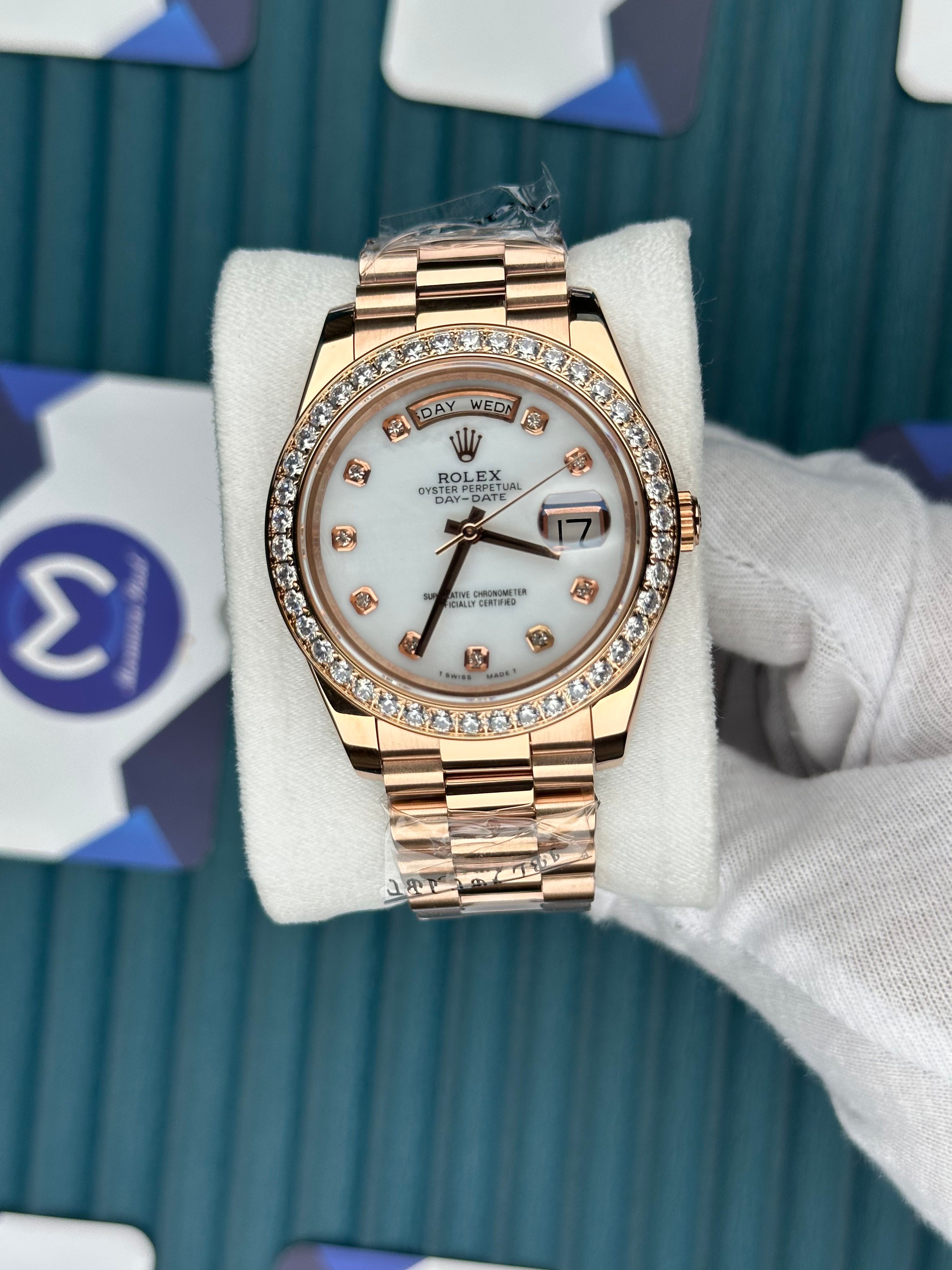 ROLEX DAY-DATE WHITE DIAL DIAMOND INDEX AND BEZEL ROSE PRESIDENT