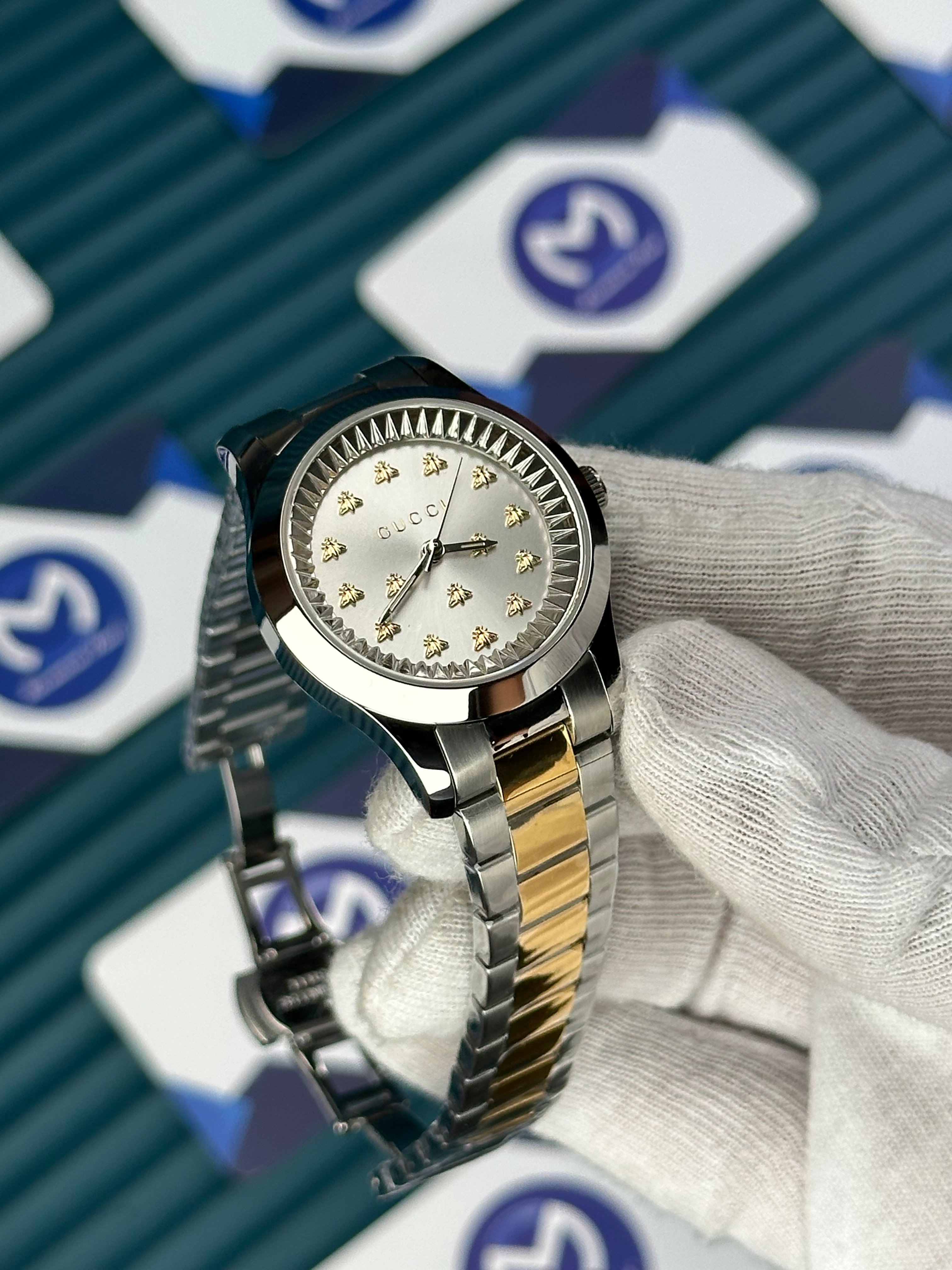 GUCCI WOMAN WHITE DIAL BUTTERFLY MOTIF GOLD-SILVER