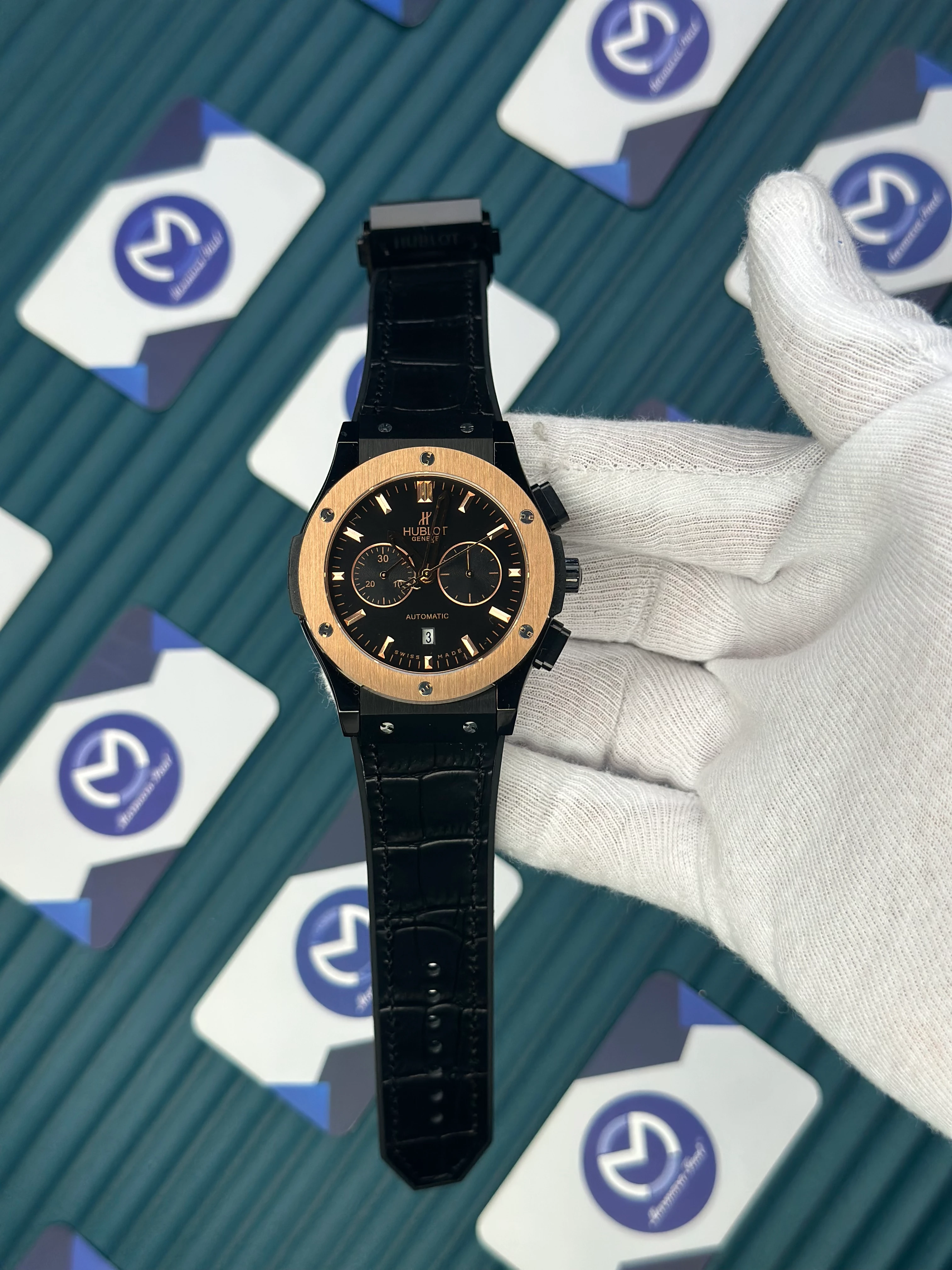 HUBLOT AUTOMATIC BLACK CHRONOGRAPH DIAL ROSE CASE BLACK CASE BLACK LEATHER CORD 