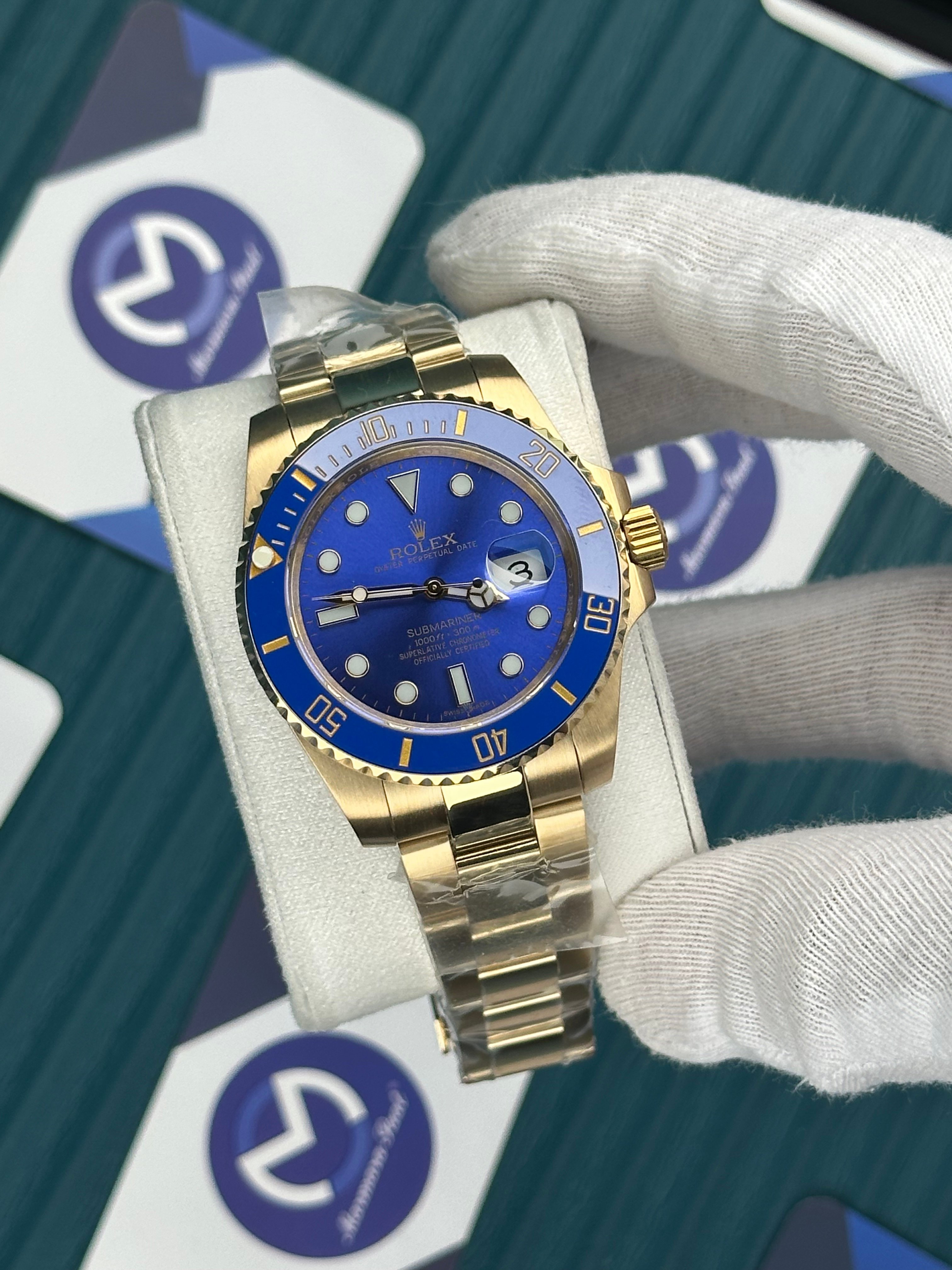 ROLEX SUBMARINER BLUE DIAL GOLD OYSTER