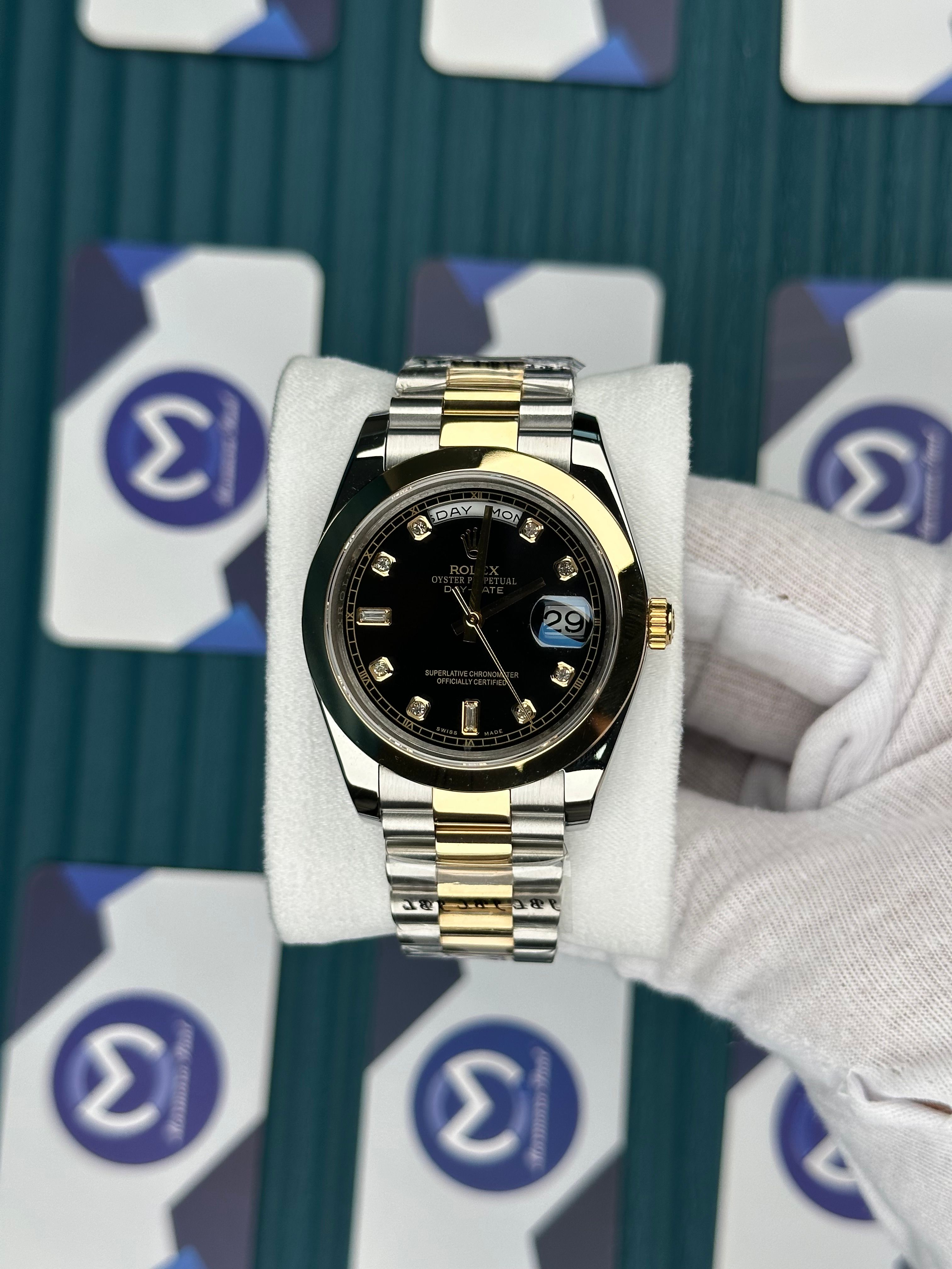 ROLEX DAY-DATE BLACK DIAL DIAMOND INDEX OVAL BEZEL GOLD-SILVER PRESIDENT