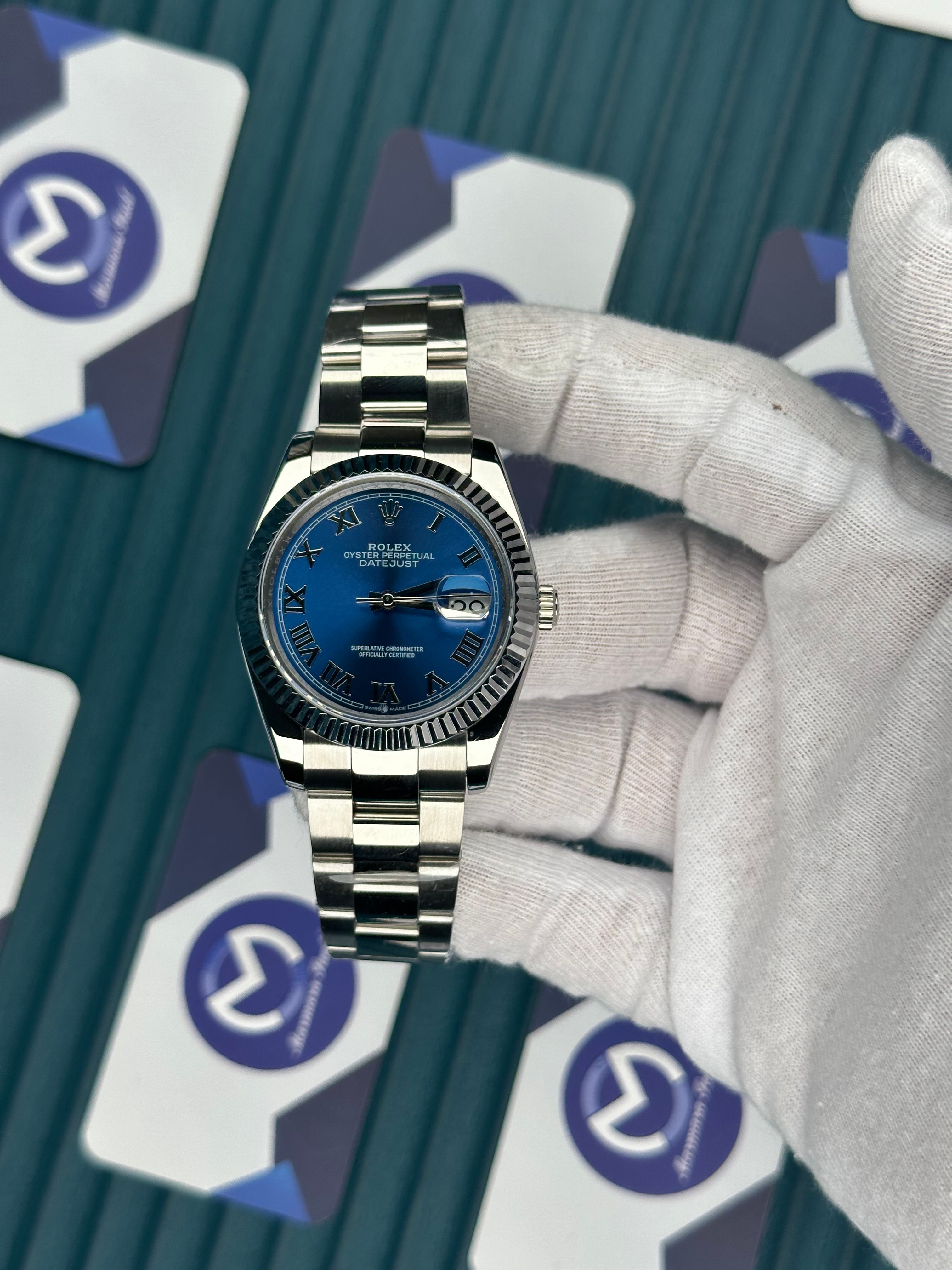 ROLEX DATEJUST BLUE DIAL ROMA INDEX SILVER OYSTER