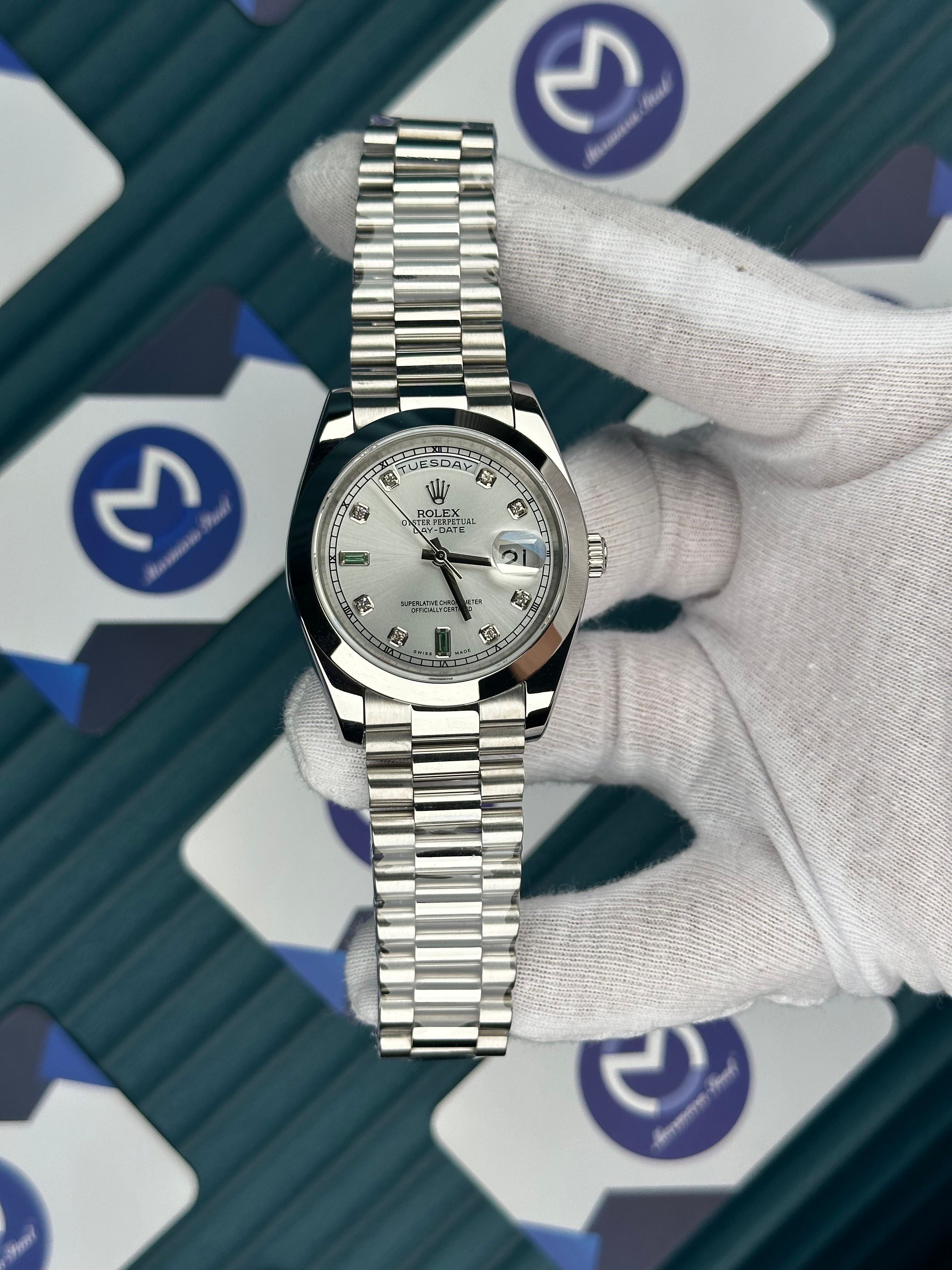 ROLEX DAY-DATE WHITE DIAL OVAL BEZEL DIAMOND INDEX SILVER PRESIDENT