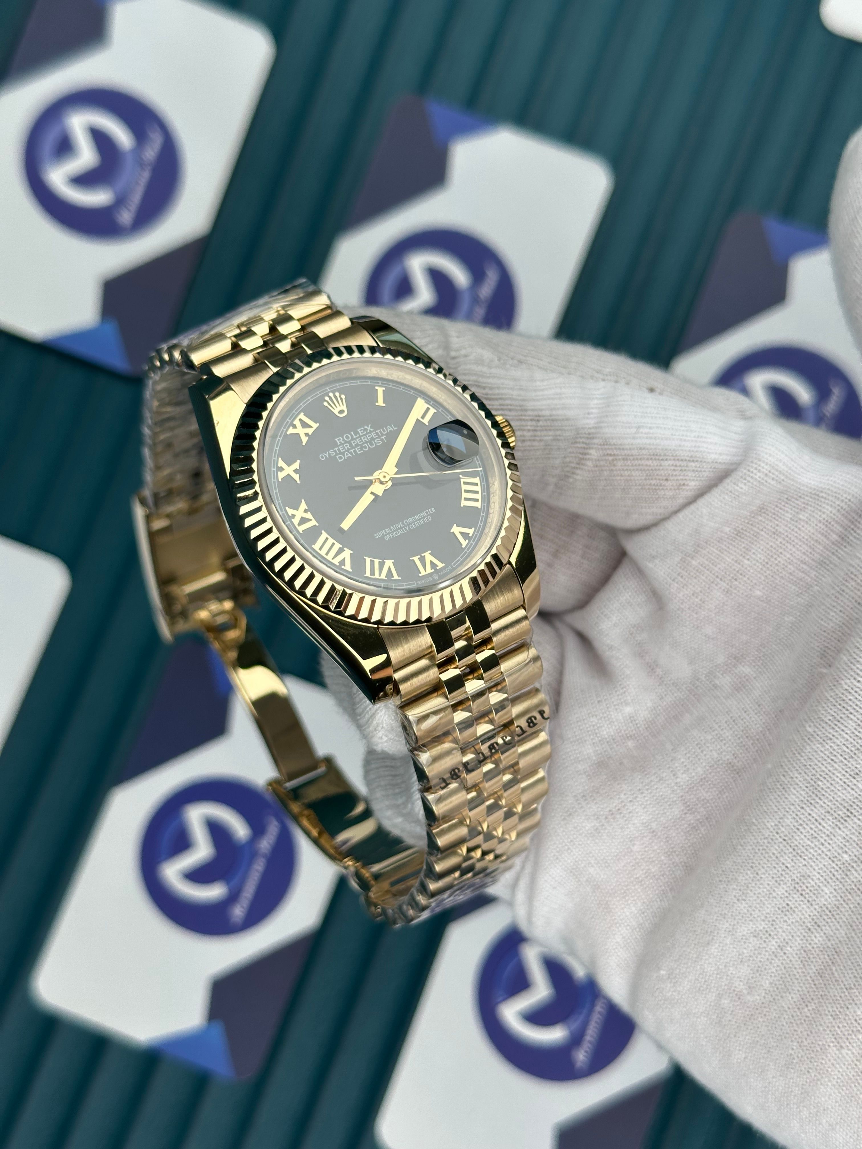 ROLEX DATEJUST BLACK DIAL ROMA INDEX GOLD JUBILE