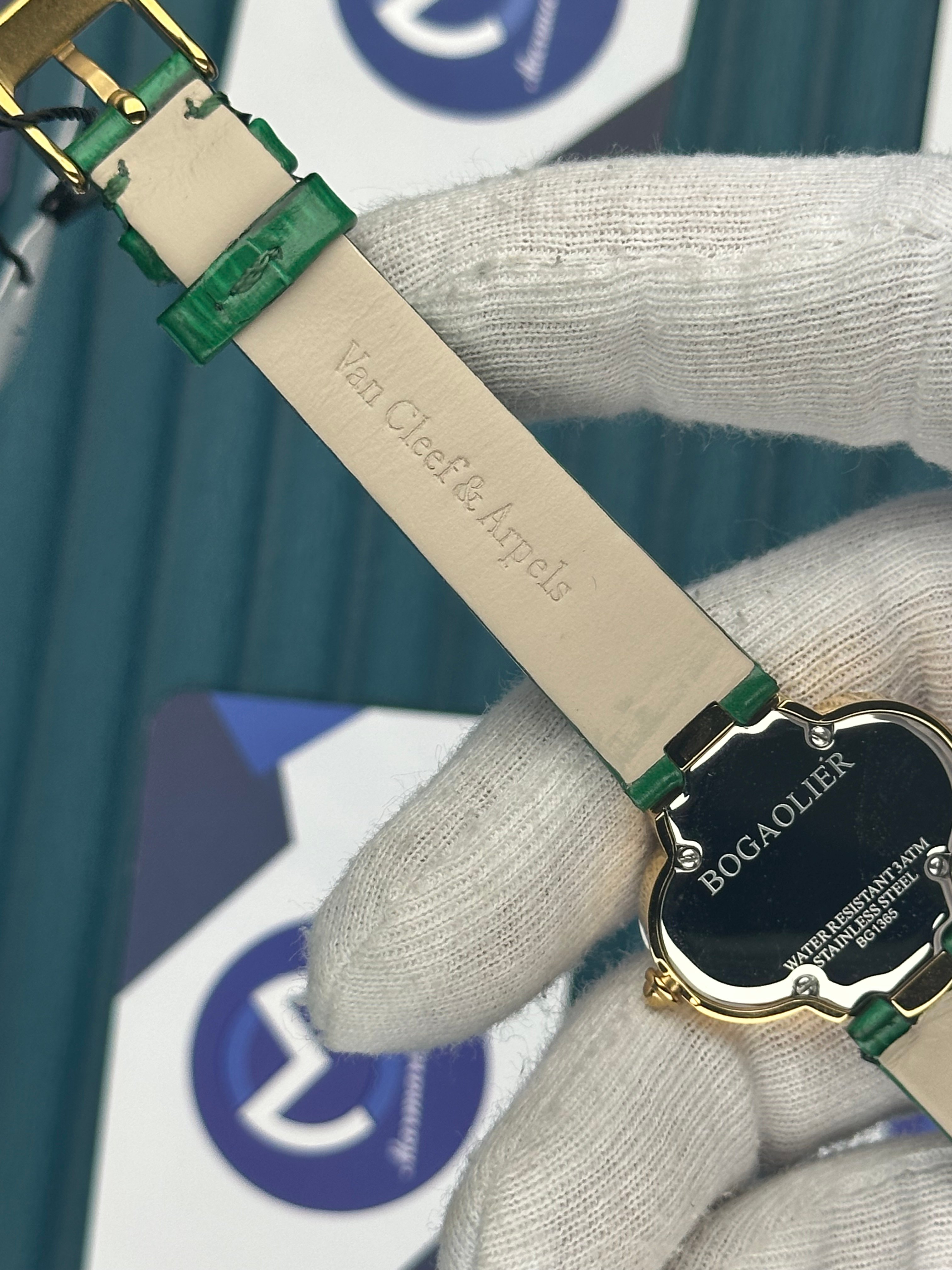 VAN CLEEF & ARPELS GREEN DIAL DIAMOND BEZEL GOLD CASE GREEN LEATHER CORD