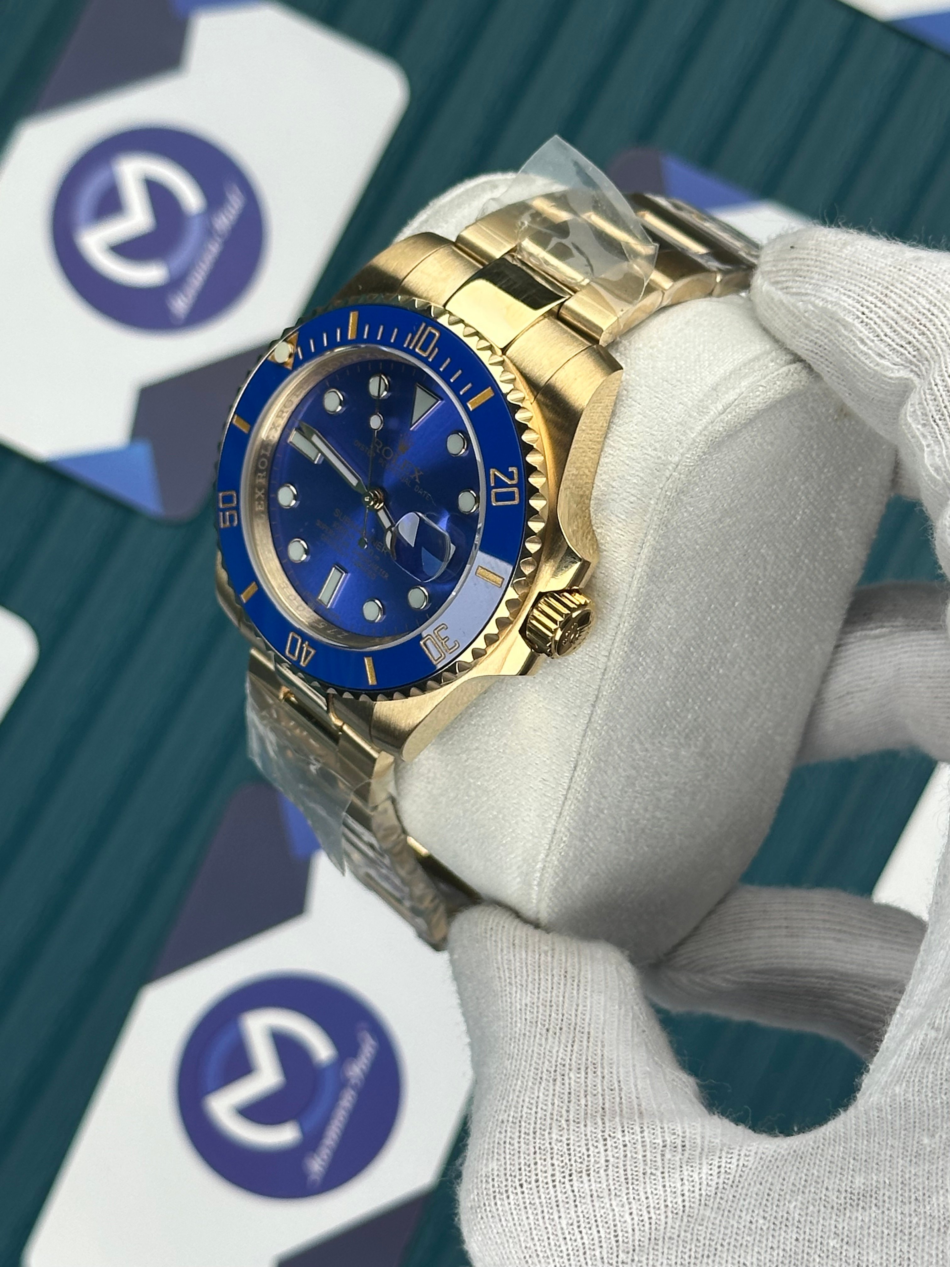 ROLEX SUBMARINER BLUE DIAL GOLD OYSTER