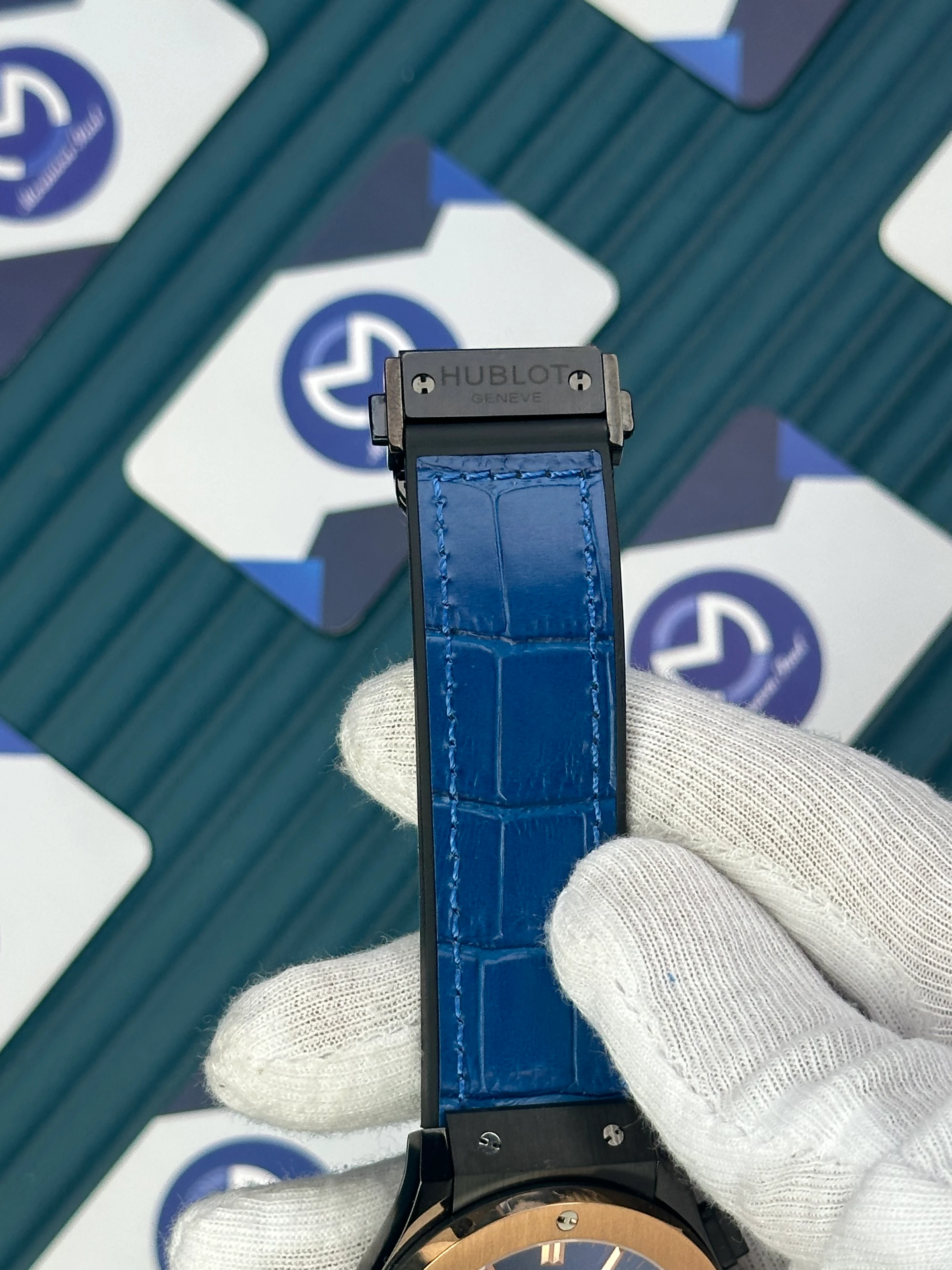 HUBLOT AUTOMATIC NAVY BLUE CHRONOGRAPH ROSE CASE BLACK CASE BLUE LEATHER CORD 