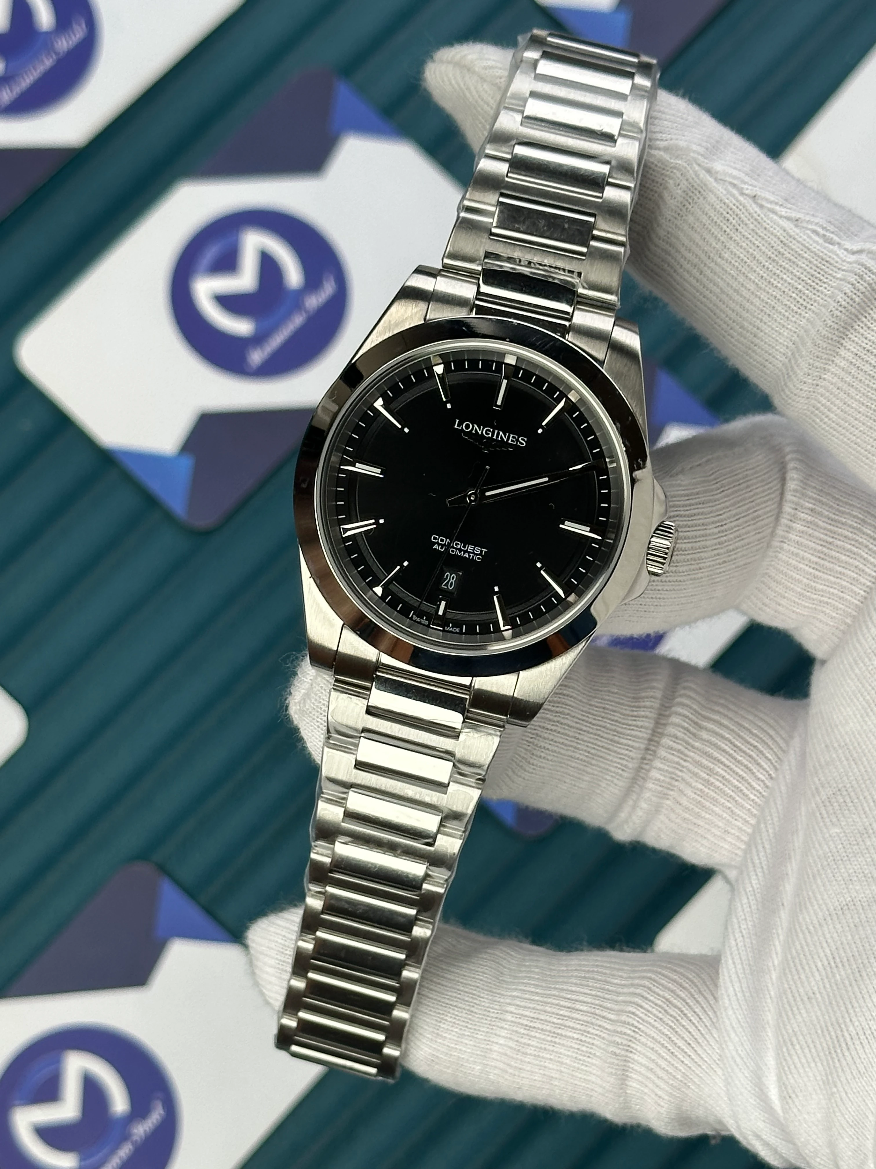 LONGINES CONQUEST AUTOMATIC BLACK DIAL SILVER 