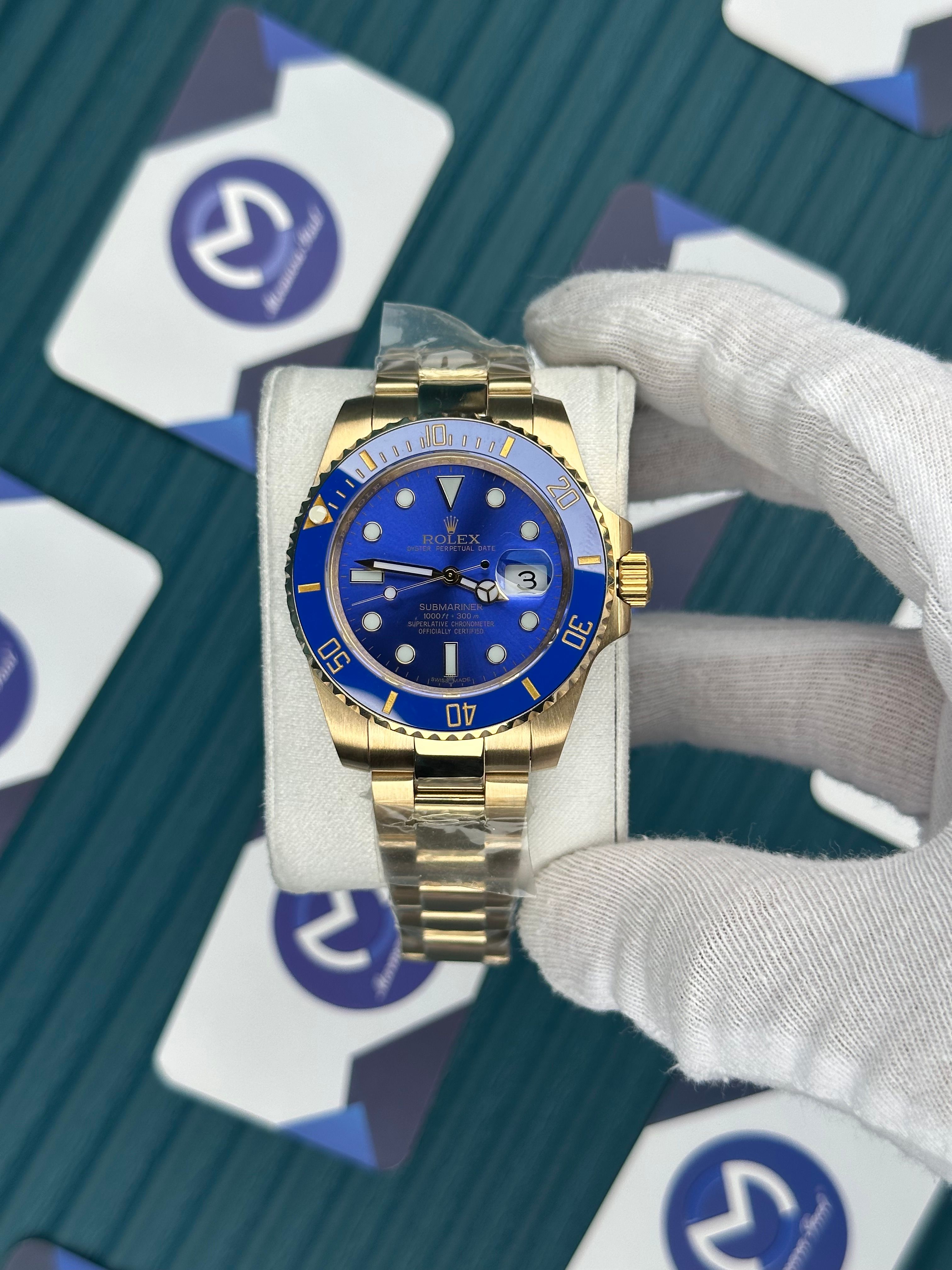 ROLEX SUBMARINER BLUE DIAL GOLD OYSTER
