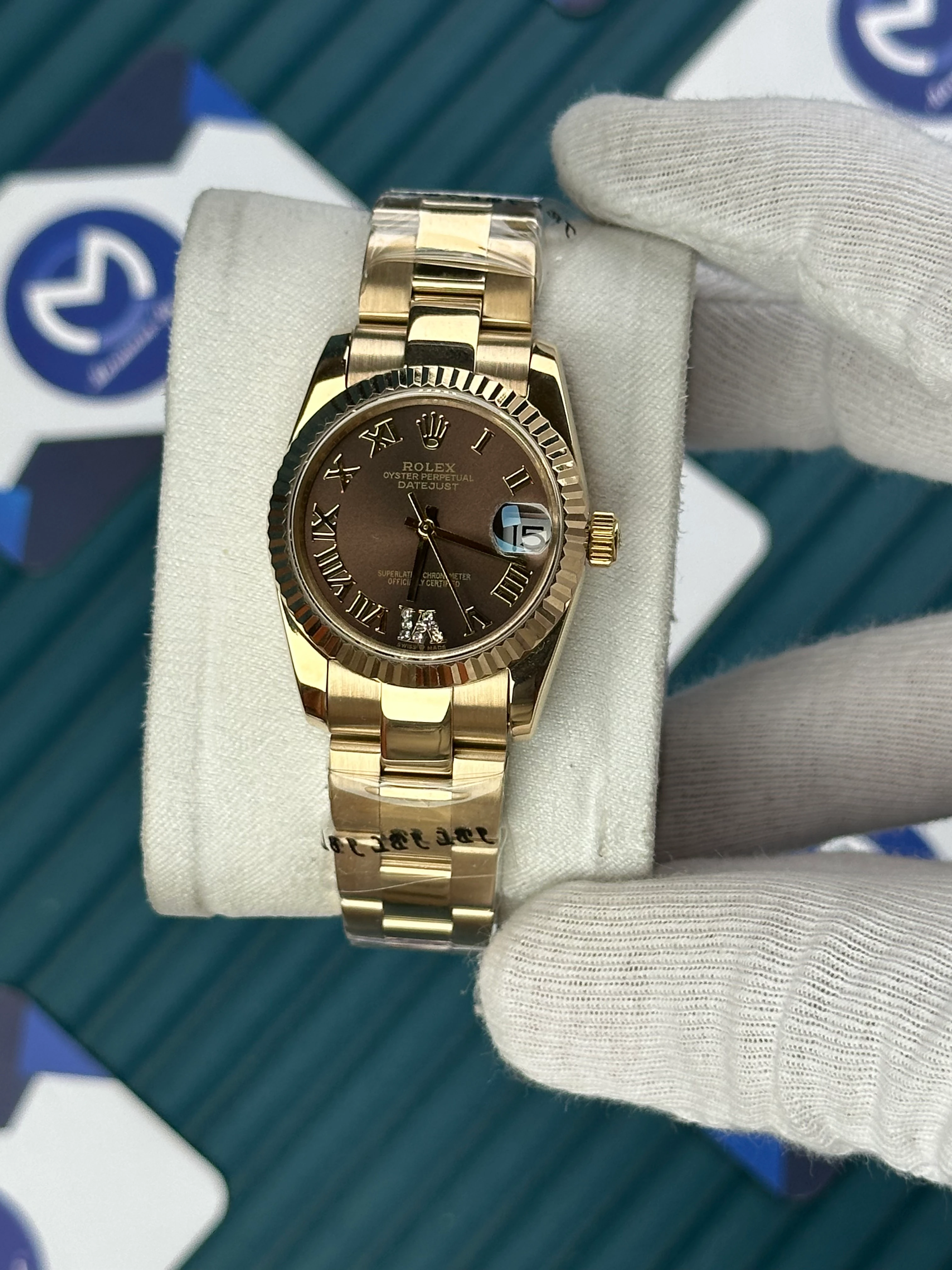 ROLEX 31 MM DATEJUST BROWN DIAL ROMA INDEX GOLD OYSTER 