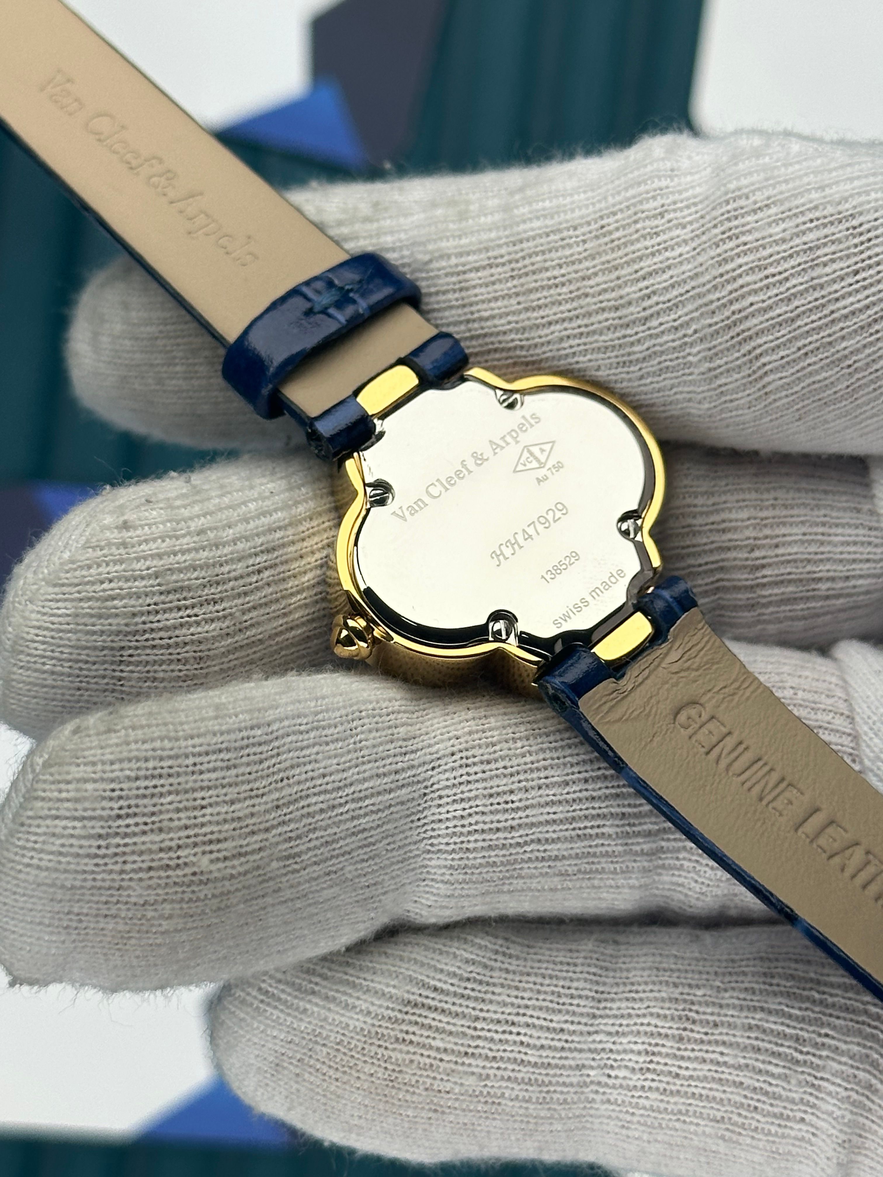 VAN CLEEF & ARPELS WHITE DIAL DIAMOND BEZEL GOLD CASE BLUE LEATHER CORD