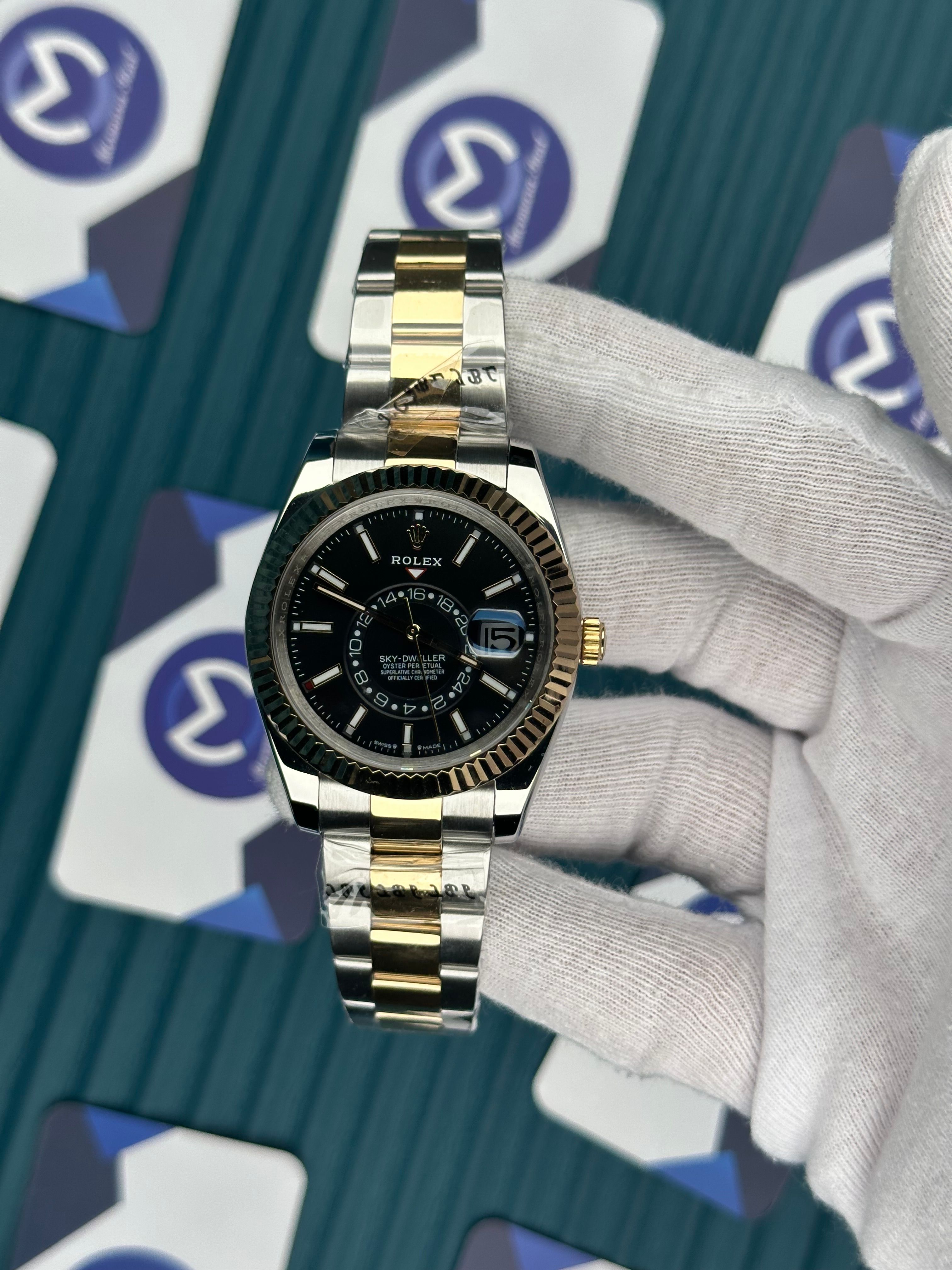 ROLEX SKY-DWELLER BLACK DIAL GOLD-SILVER OYSTER