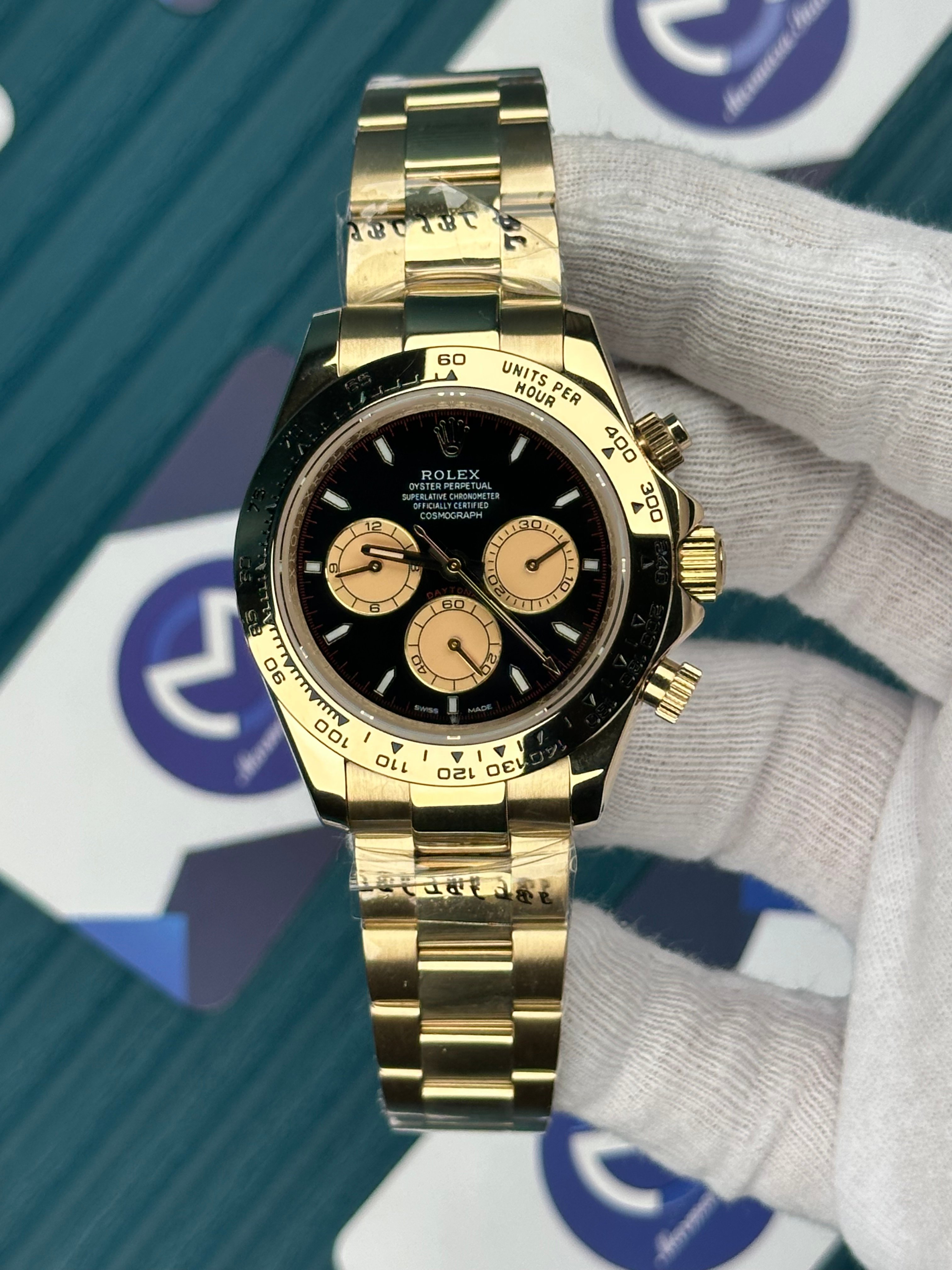 ROLEX DAYTONA BLACK DIAL GOLD OYSTER